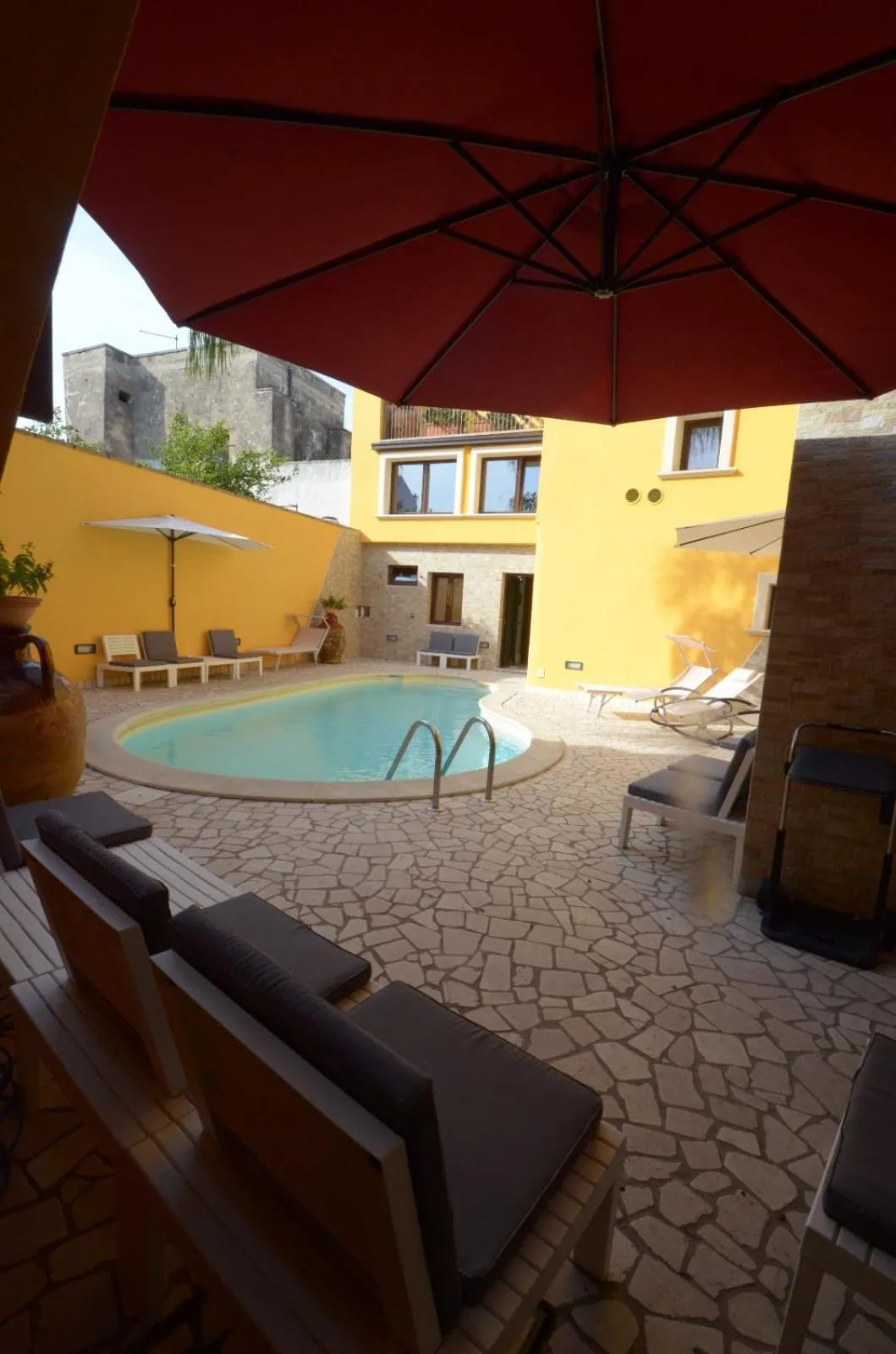 Swimming pool in B&B Corte Dei Figuli