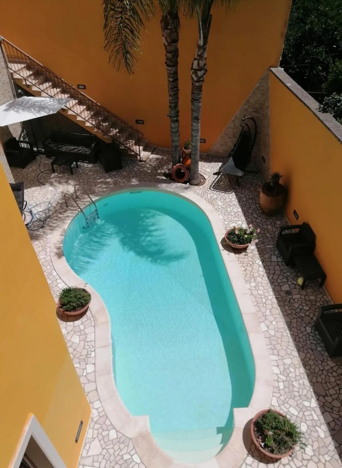 Swimming pool in B&B Corte Dei Figuli