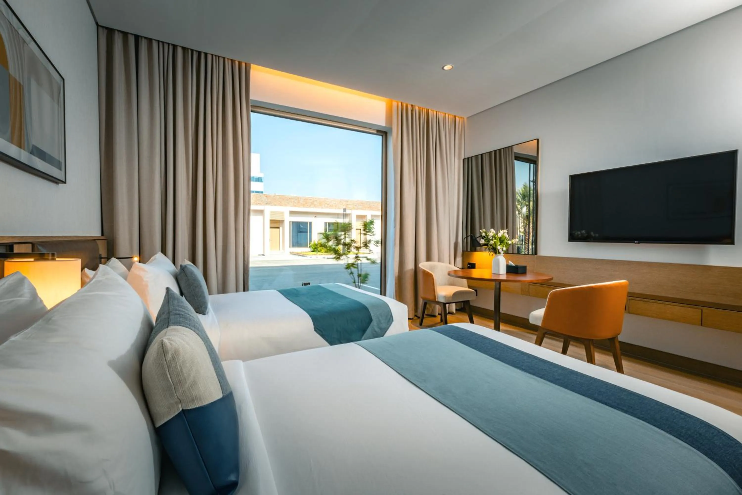 Bed in First Grand Hotel