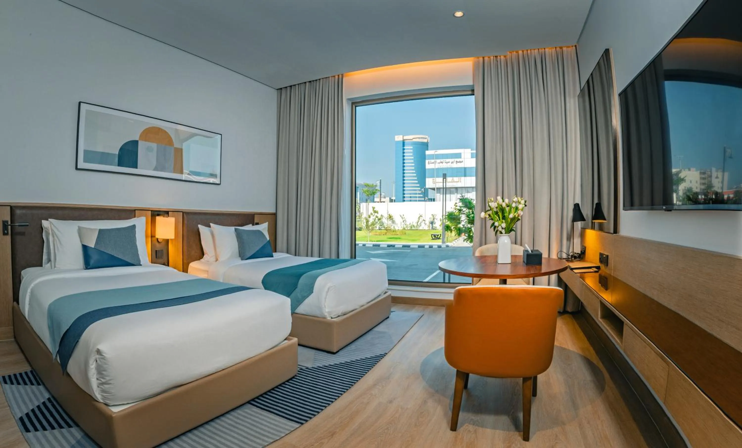 Bed in First Grand Hotel