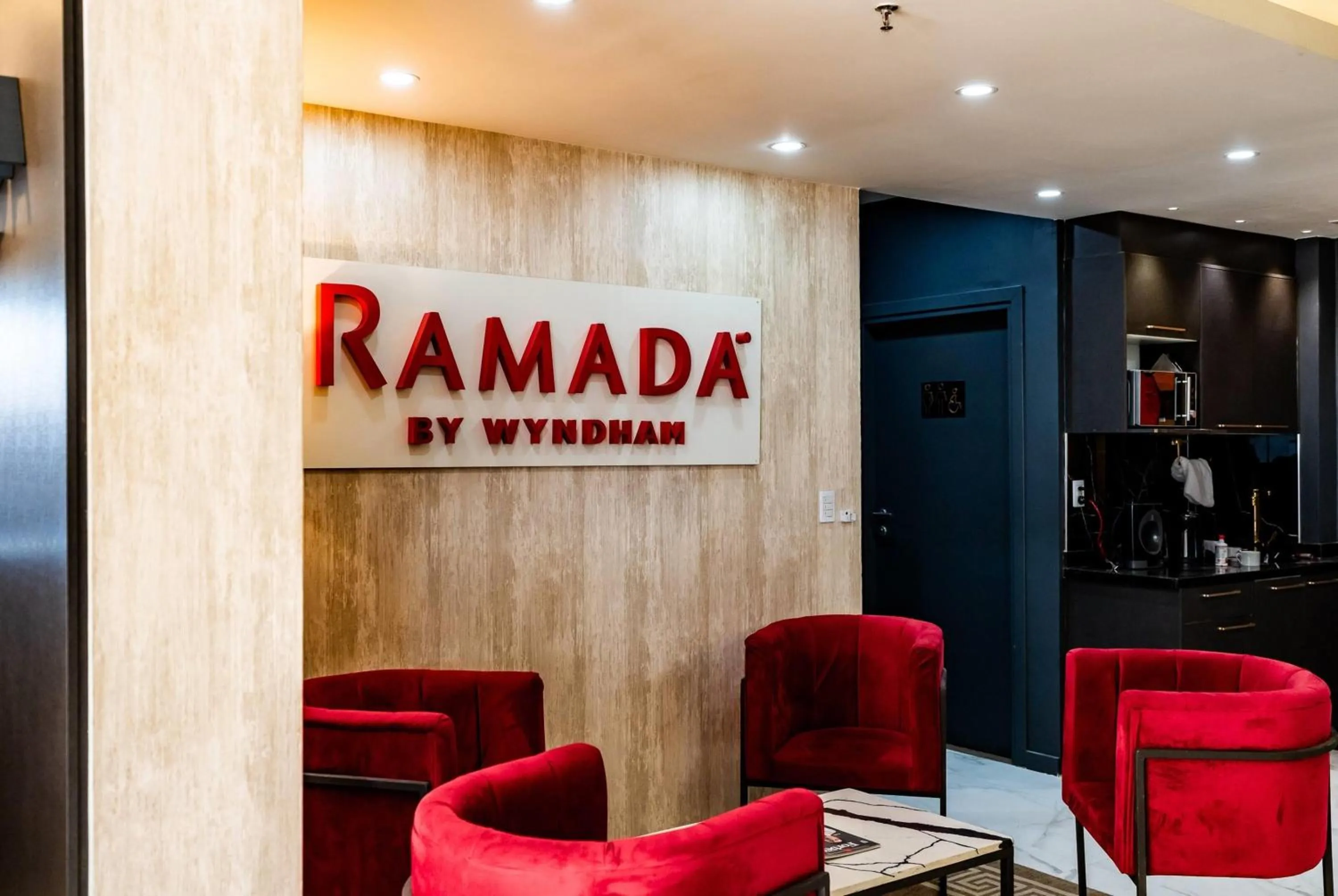 Lobby or reception in Ramada Suites by Wyndham Asuncion Aeropuerto