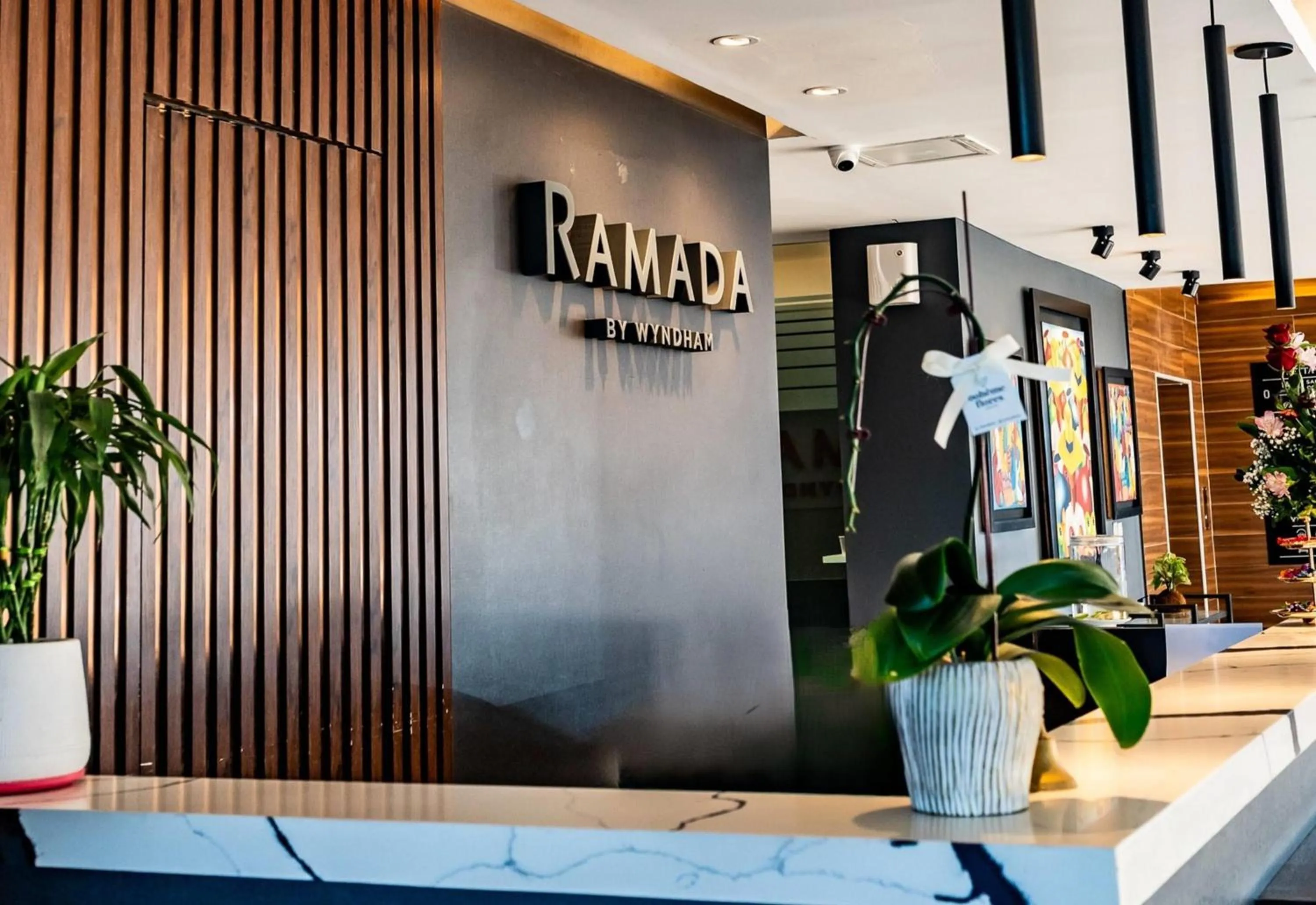 Lobby or reception in Ramada Suites by Wyndham Asuncion Aeropuerto