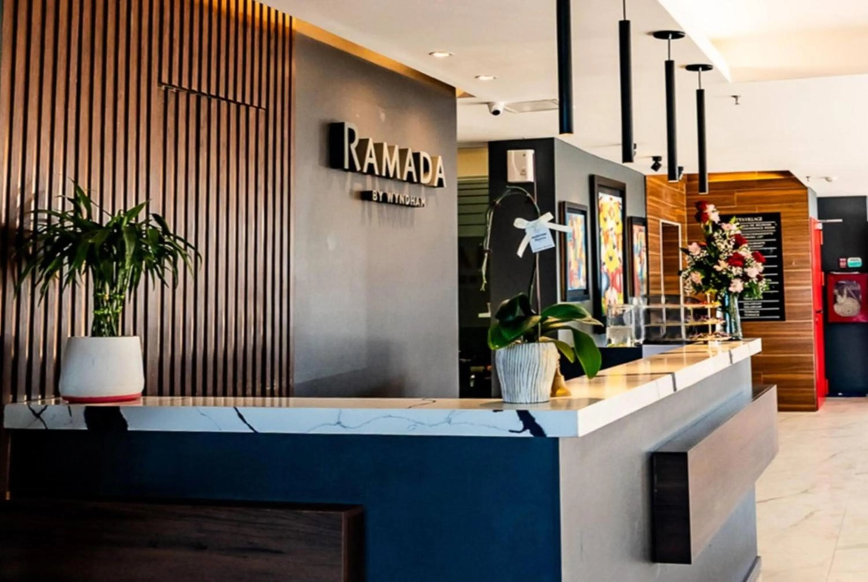 Lobby or reception in Ramada Suites by Wyndham Asuncion Aeropuerto