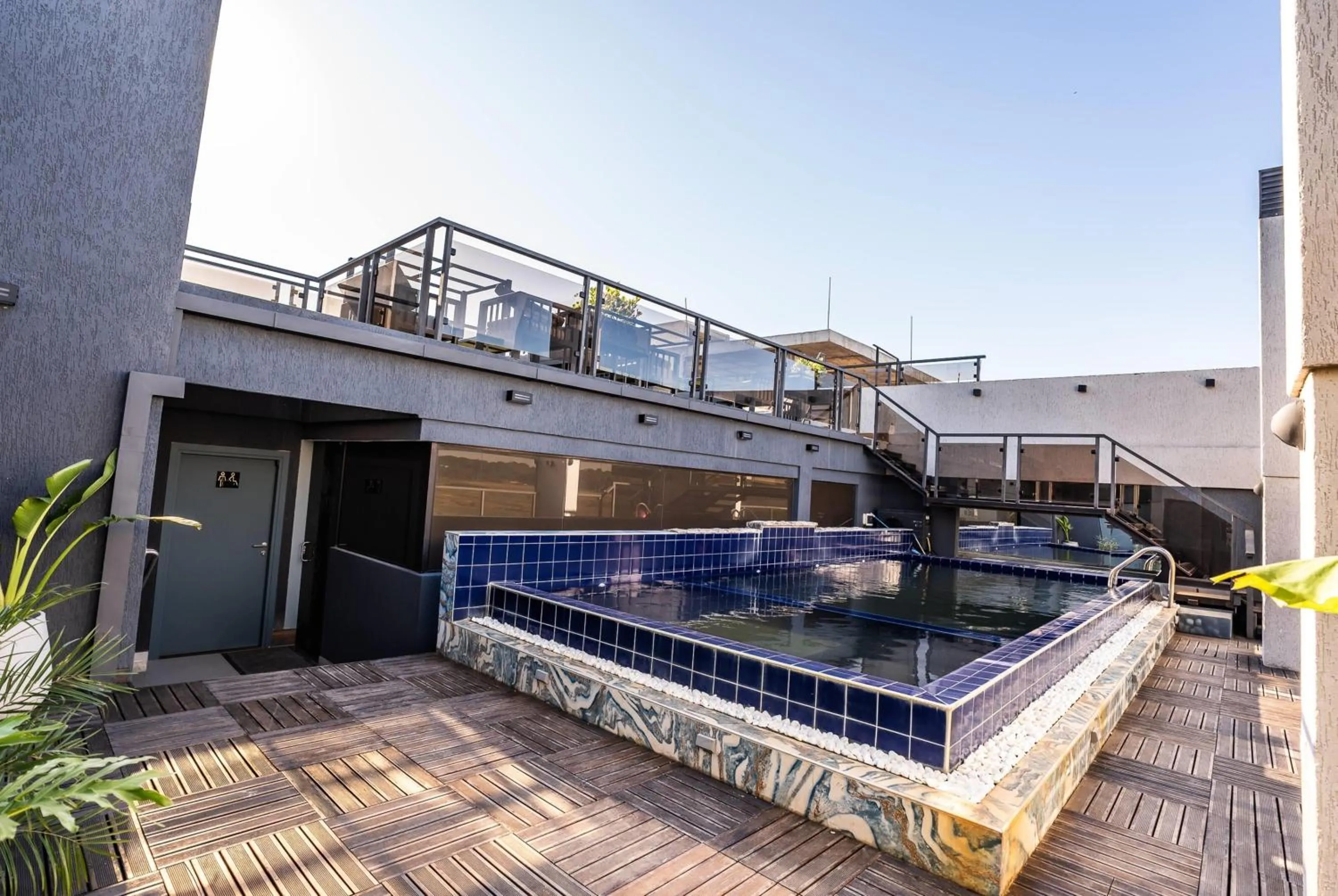 Pool view in Ramada Suites by Wyndham Asuncion Aeropuerto