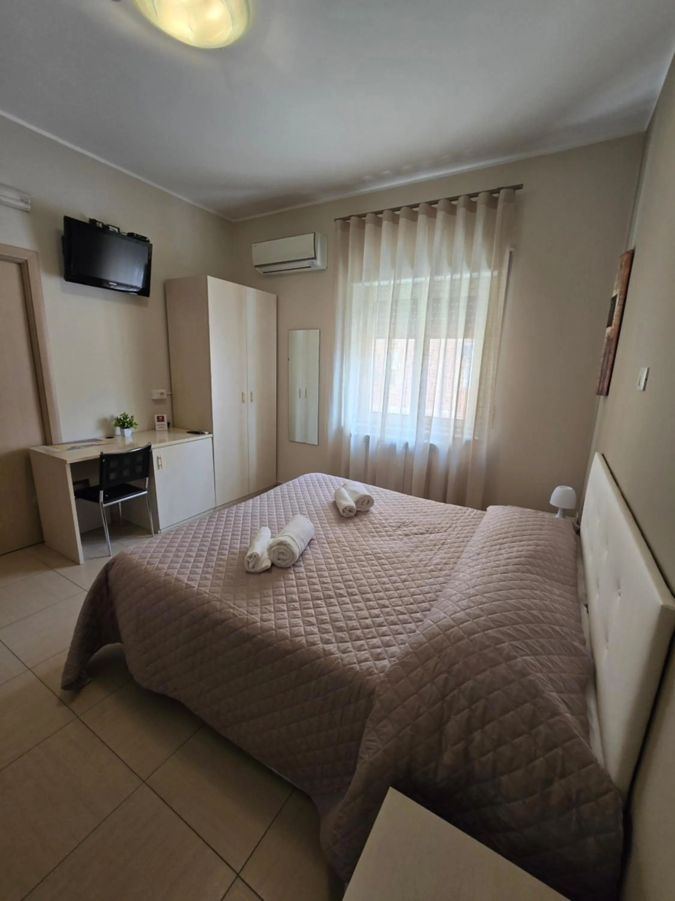 Bed in Il Fiore di San Giovanni B&B