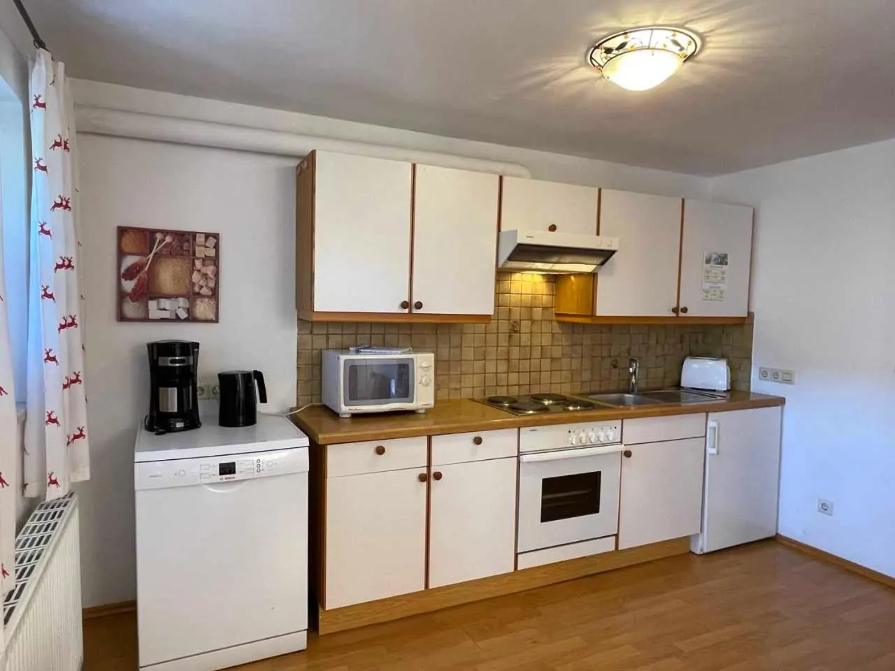 Kitchen or kitchenette in Chalet Zauberflöte