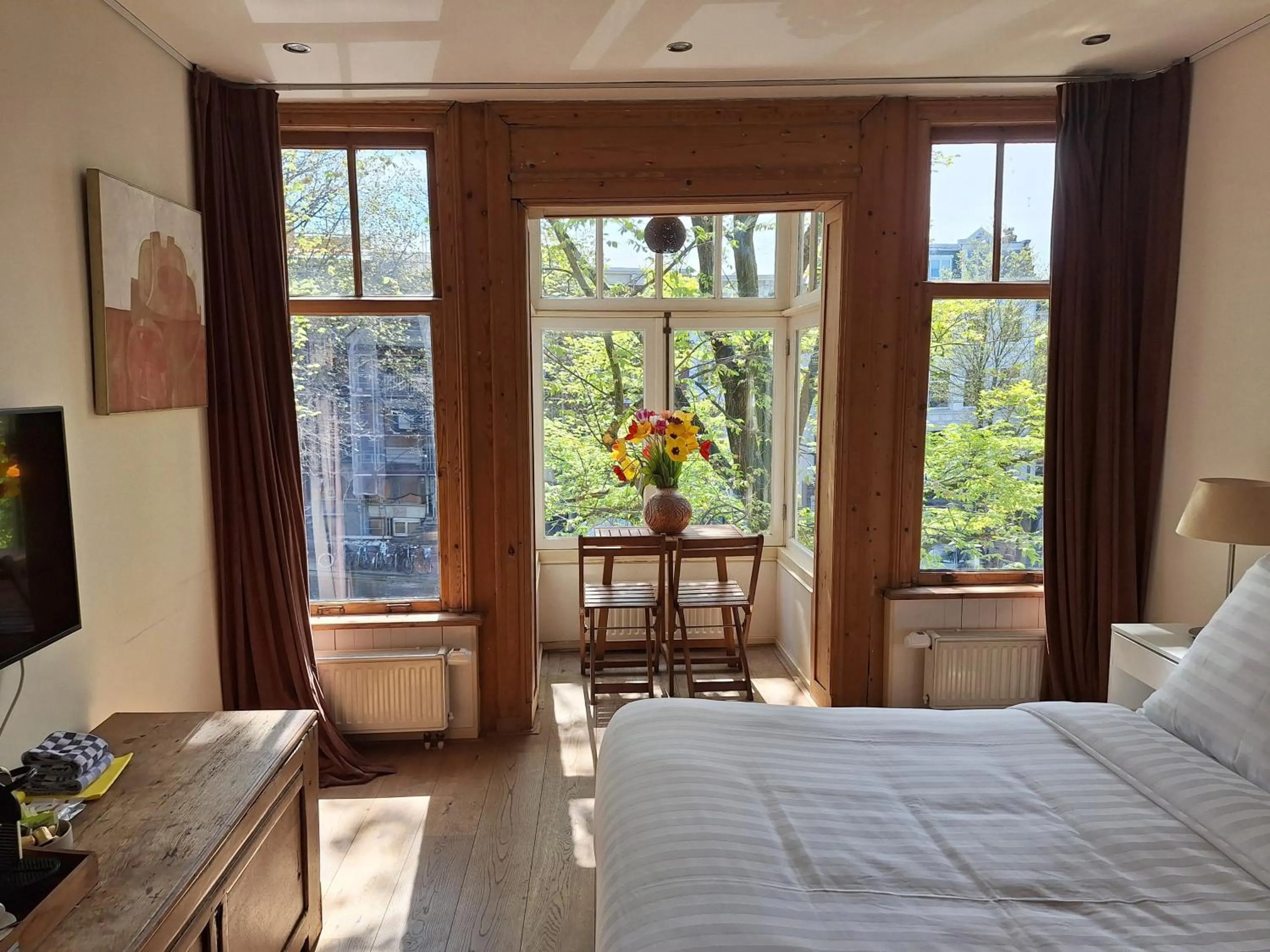 Communal lounge/ TV room, Bed in A B&B Amsterdam