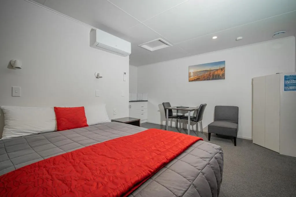 Bed in Welcome Inn Motel Levin