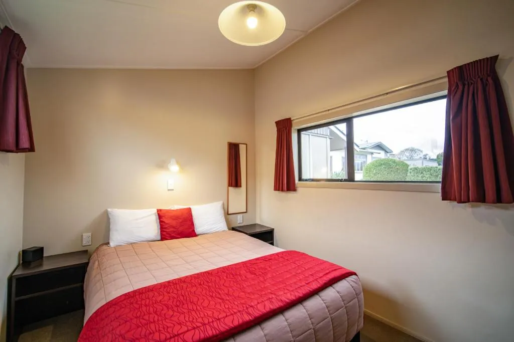 Bed in Welcome Inn Motel Levin