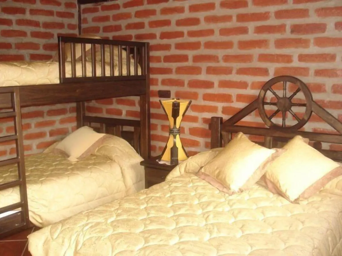 Bed in Hosteria Sumak Pakari