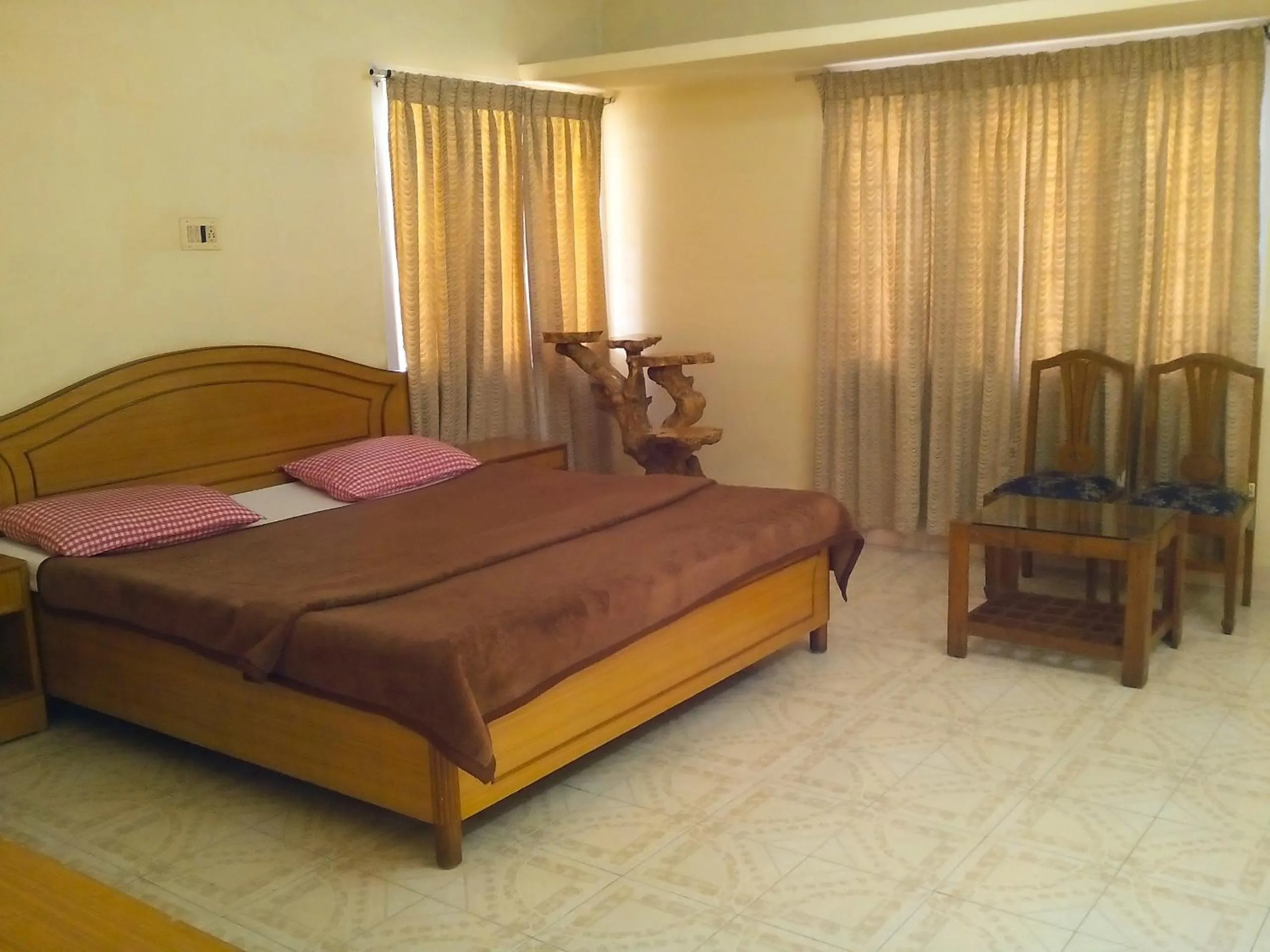 Photo of the whole room, Bed in Rainbow Cottages-Budget Friendly rooms