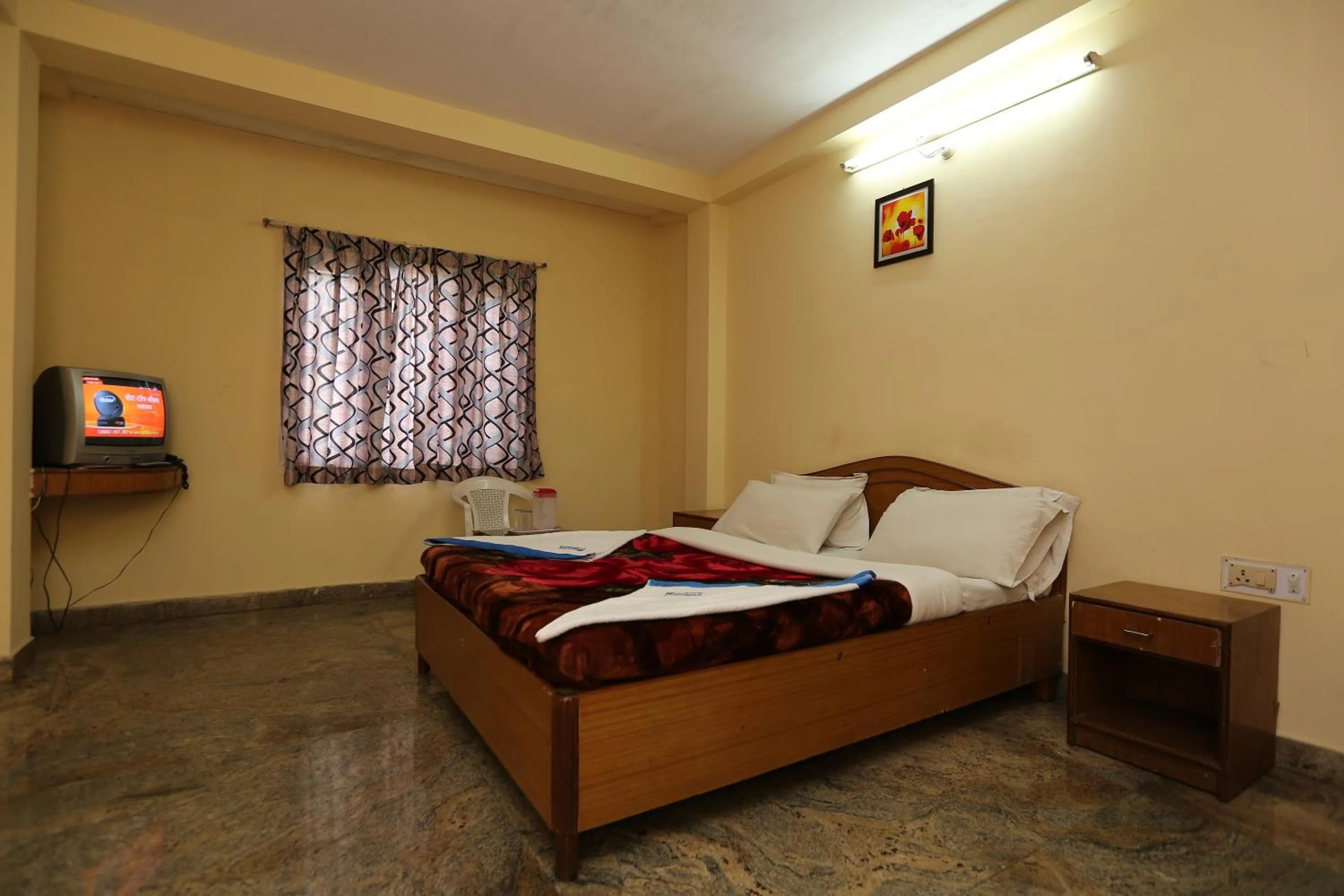 Photo of the whole room, Bed in Rainbow Cottages-Budget Friendly rooms