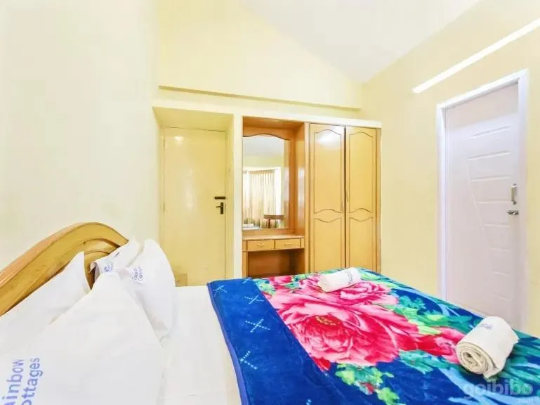 Bed in Rainbow Cottages-Budget Friendly rooms