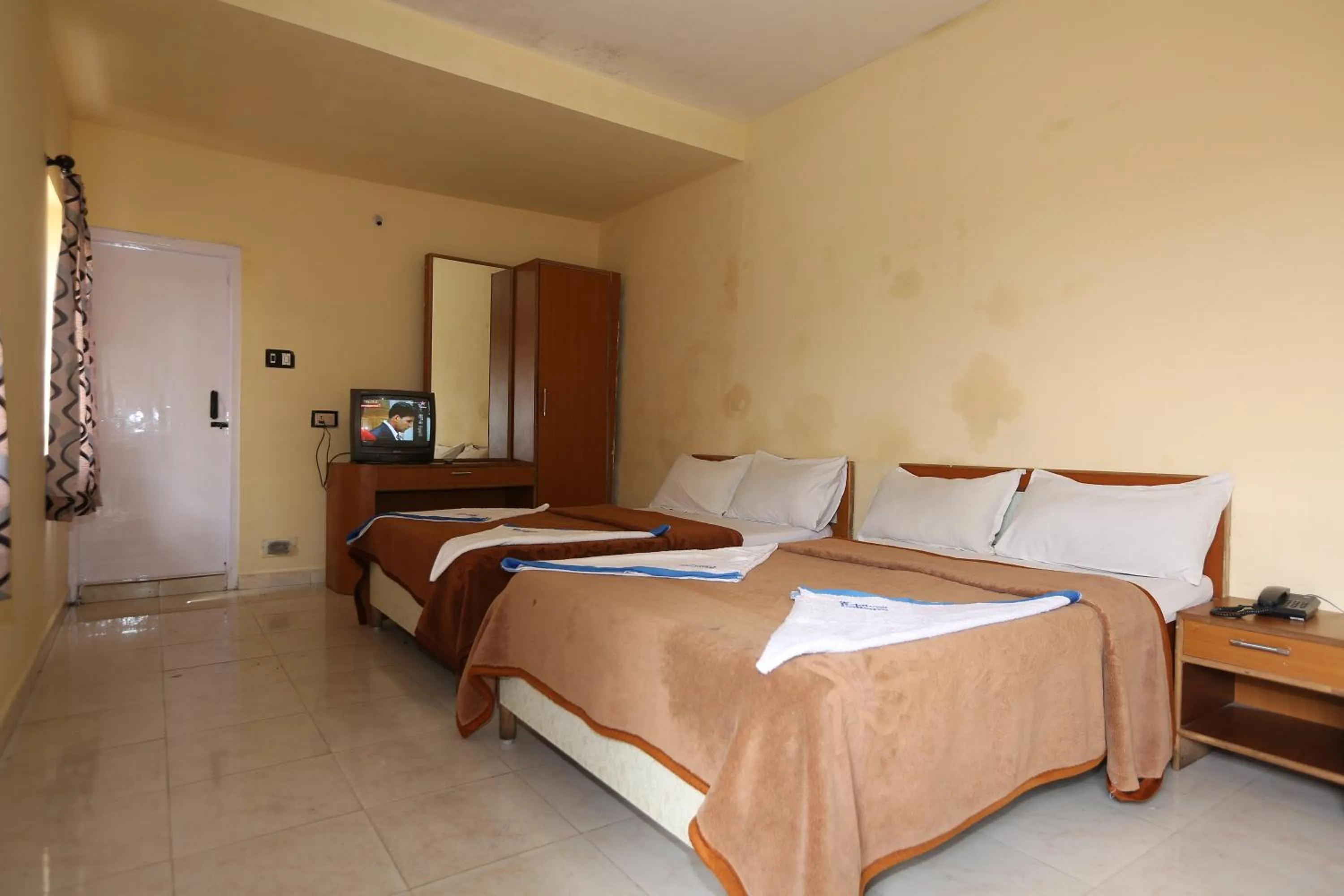 Photo of the whole room, Bed in Rainbow Cottages-Budget Friendly rooms