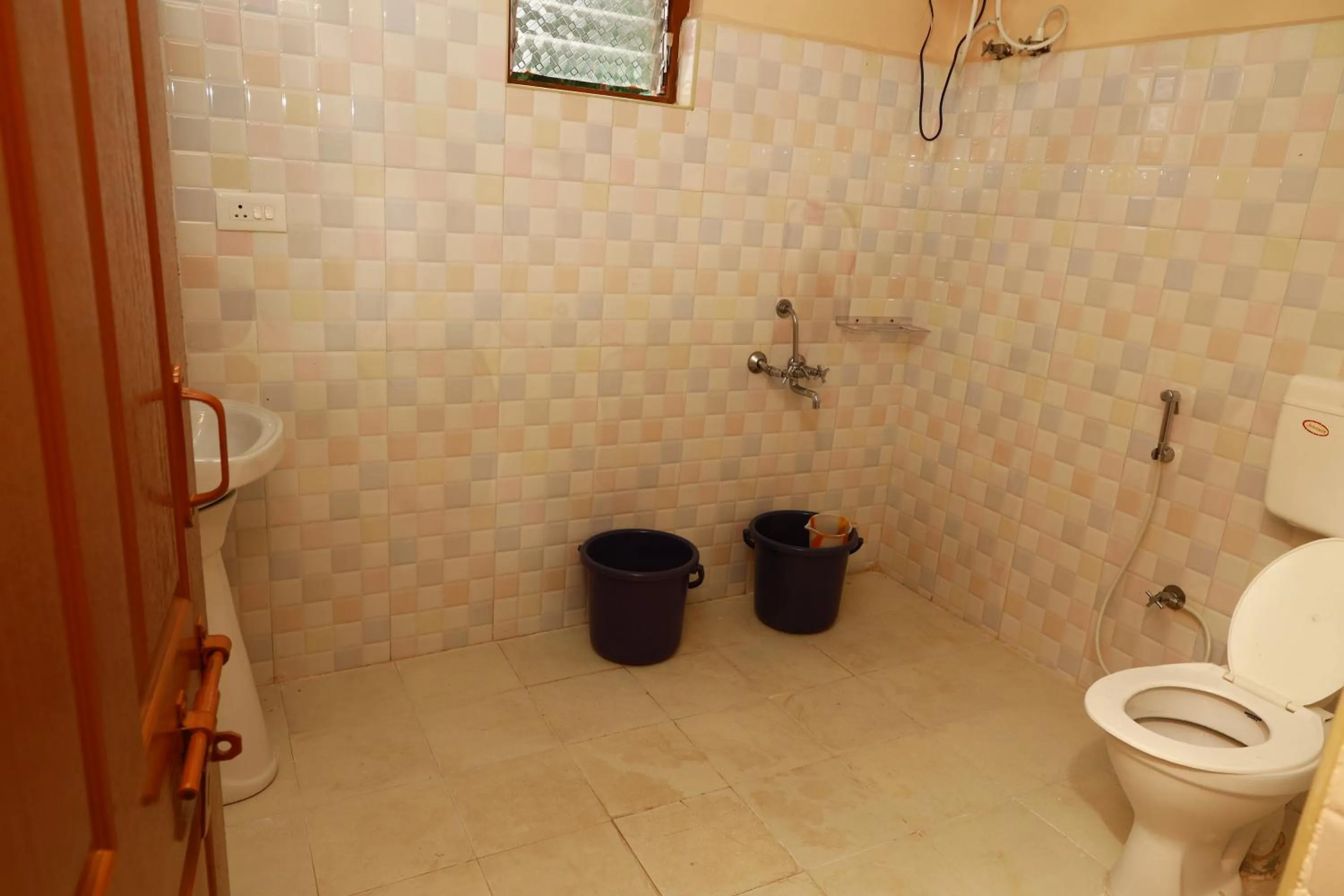 Bathroom in Rainbow Cottages-Budget Friendly rooms