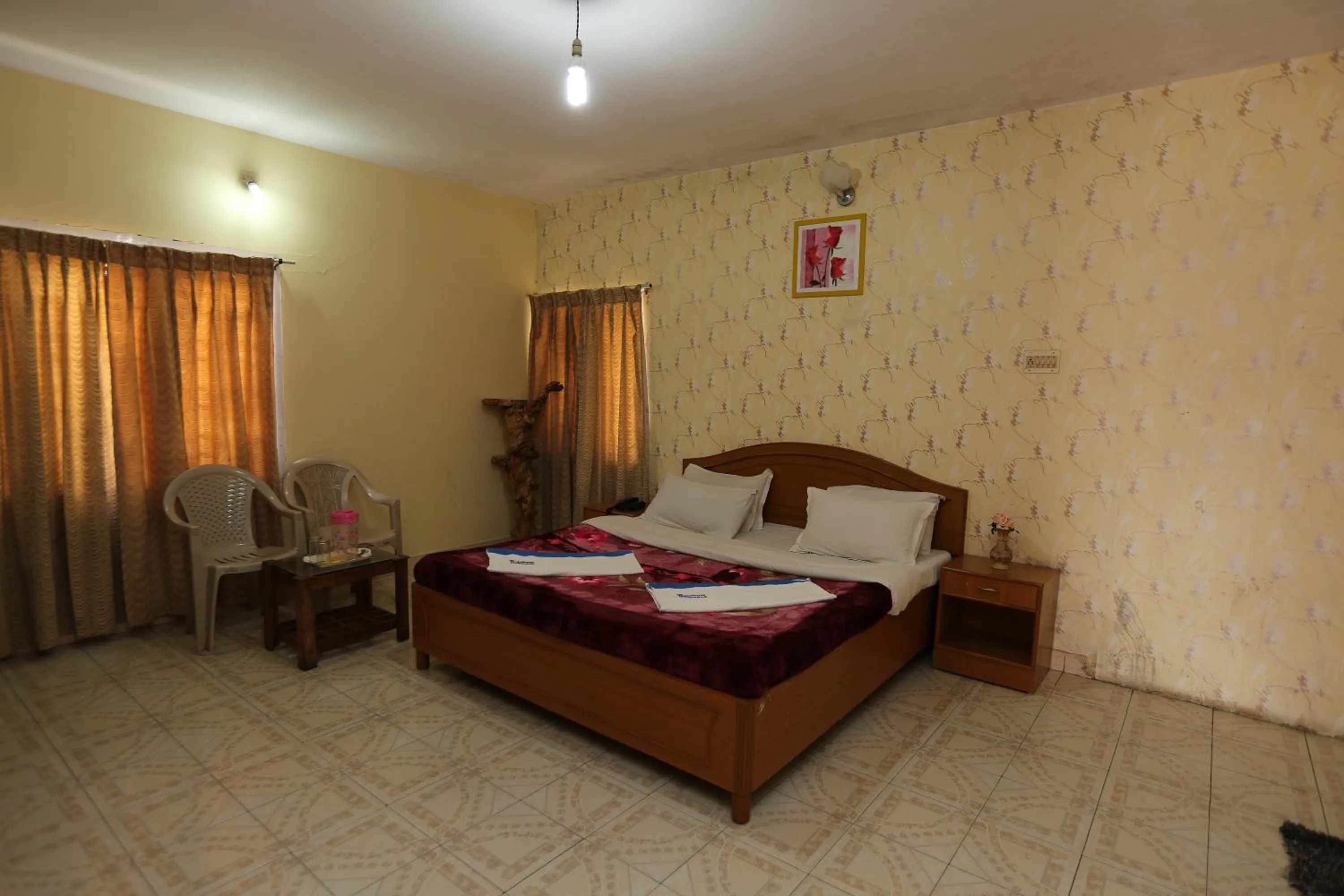 Photo of the whole room, Bed in Rainbow Cottages-Budget Friendly rooms