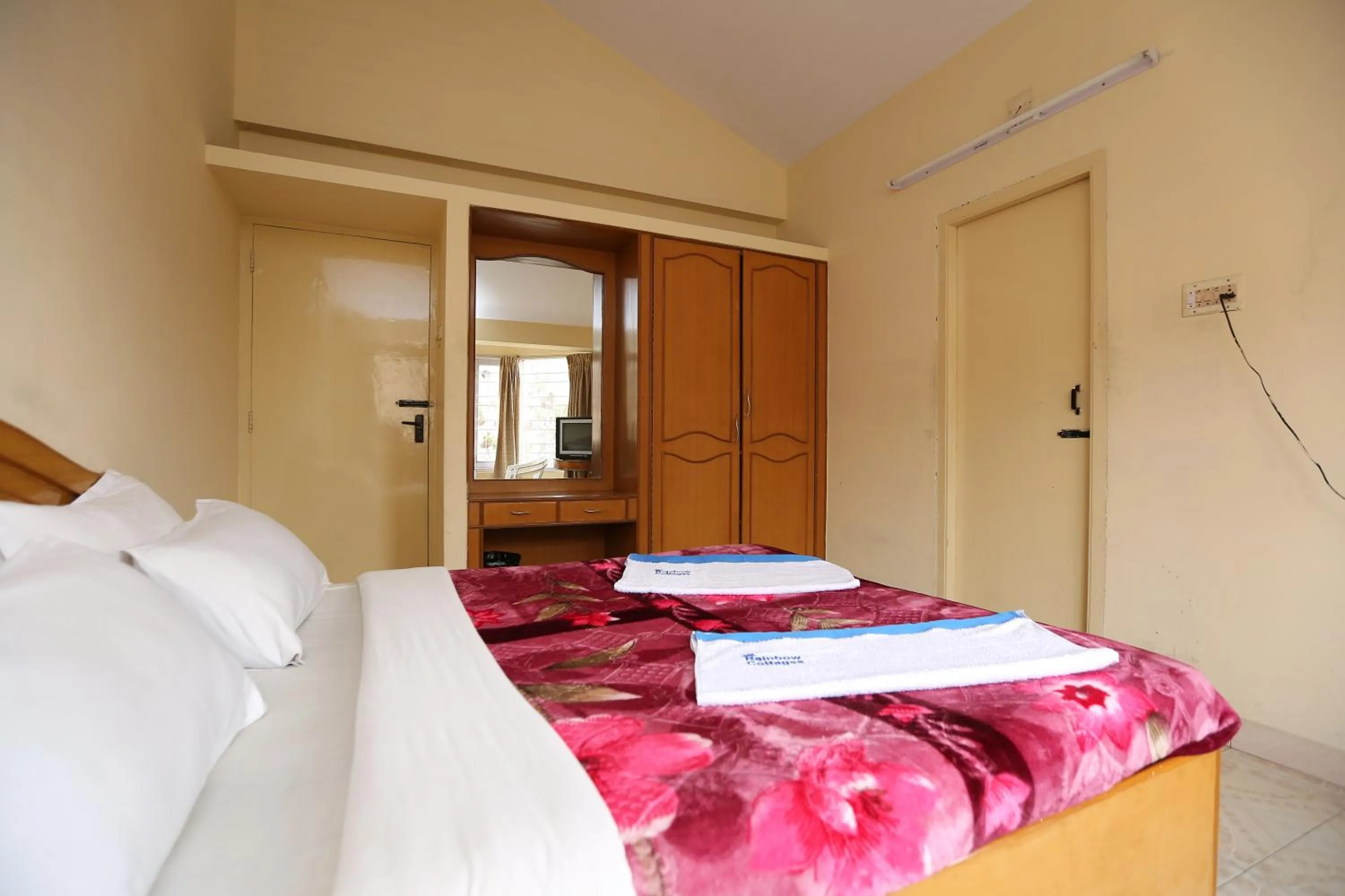 Photo of the whole room, Bed in Rainbow Cottages-Budget Friendly rooms