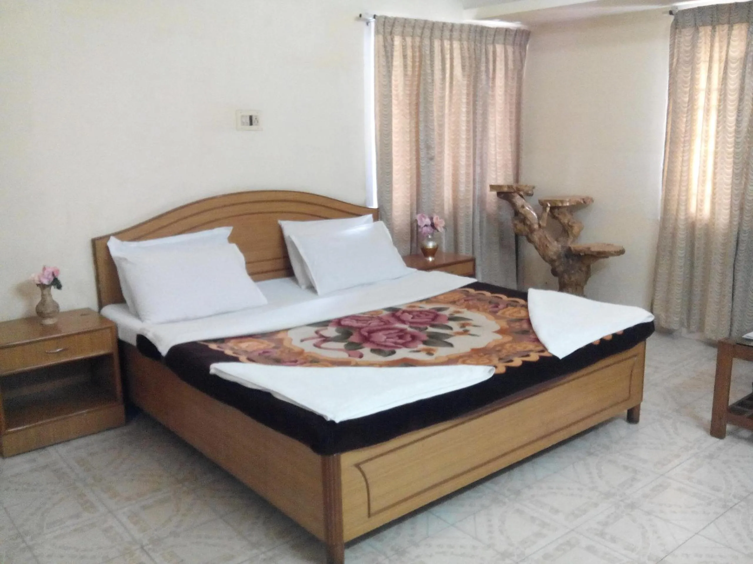 Photo of the whole room, Bed in Rainbow Cottages-Budget Friendly rooms