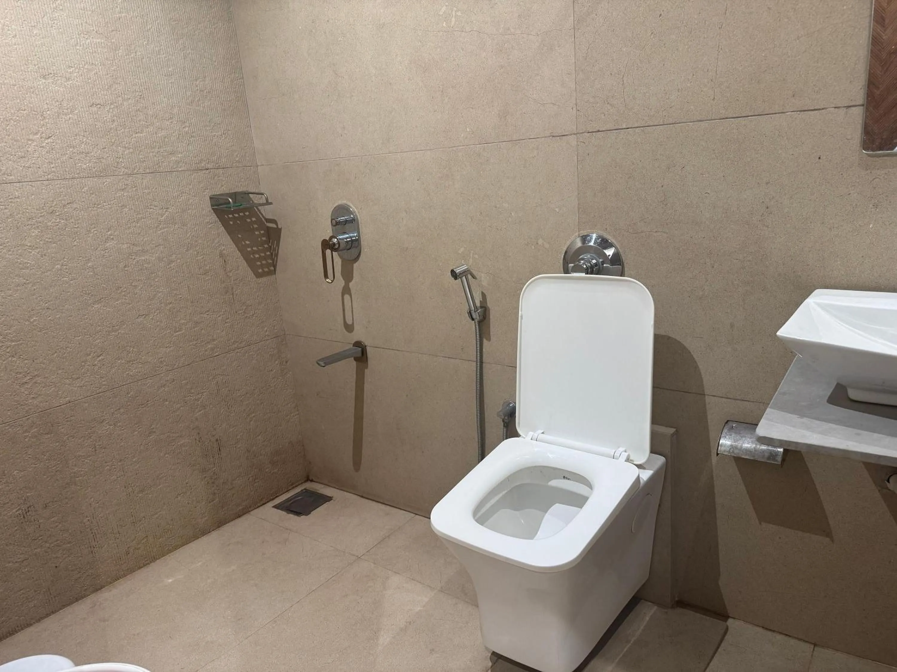 Toilet in Hotel Sahara Residency