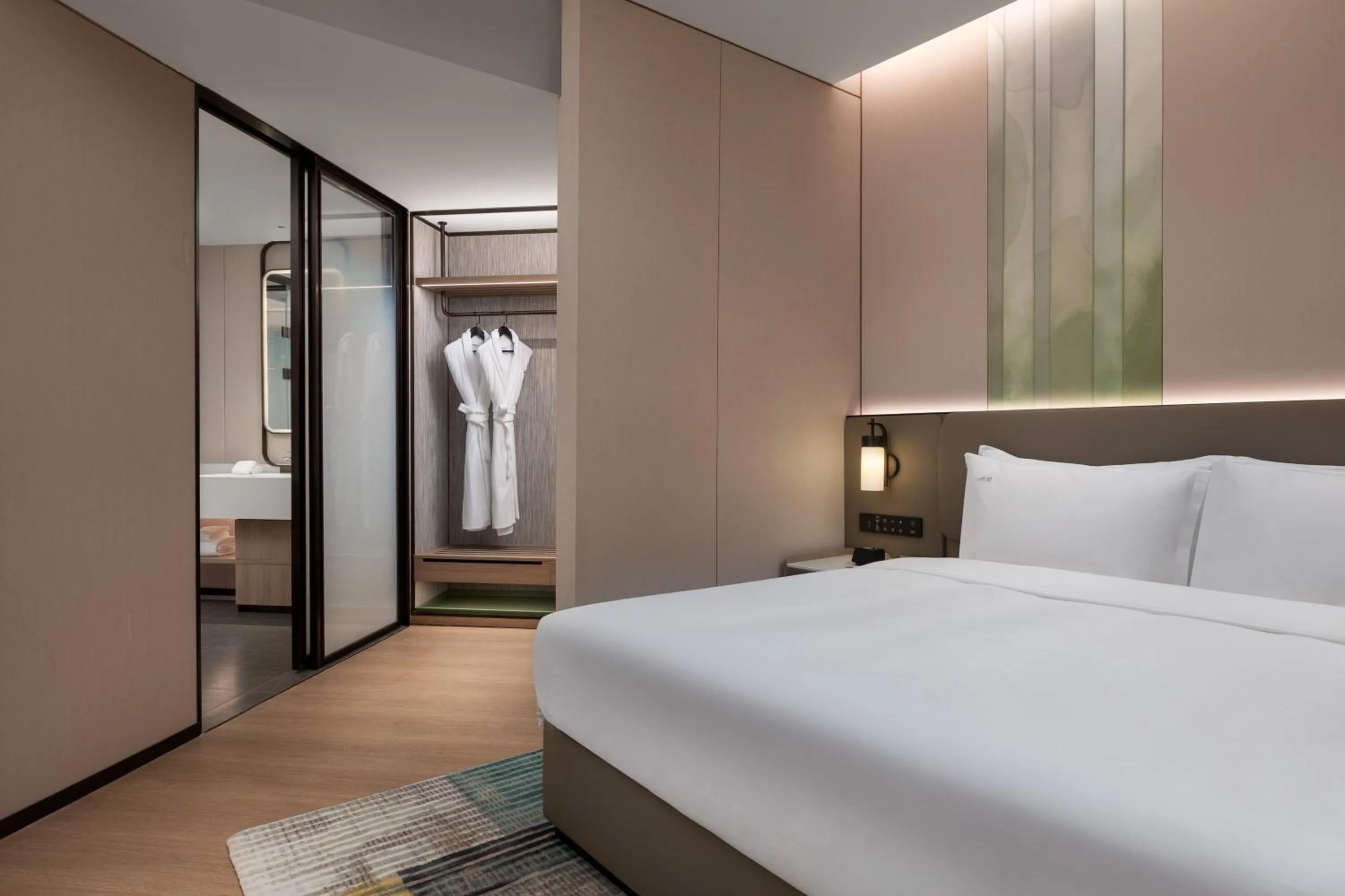 Bed in Holiday Inn & Suites Shanghai Changfeng by IHG