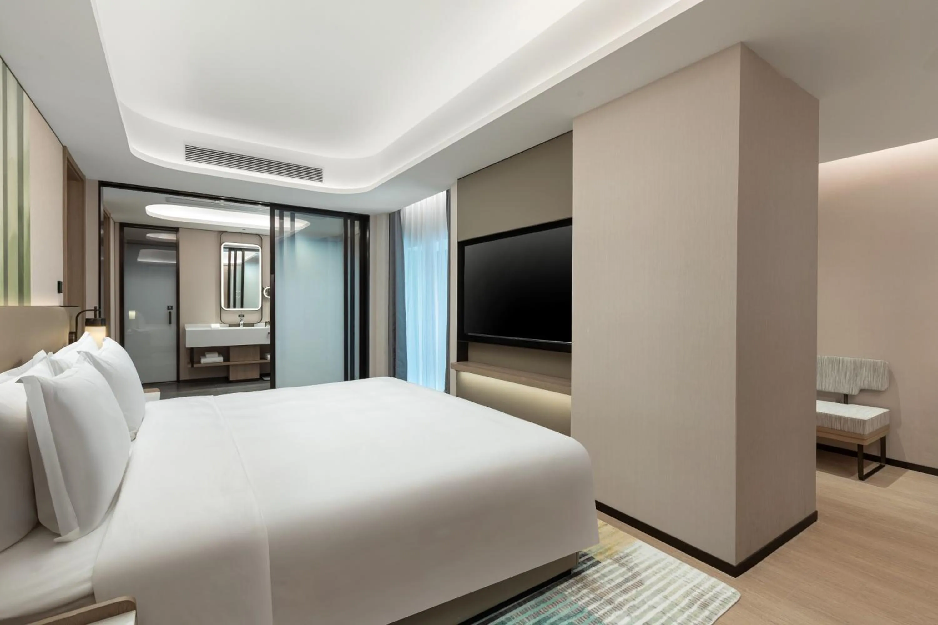 Bed in Holiday Inn & Suites Shanghai Changfeng by IHG