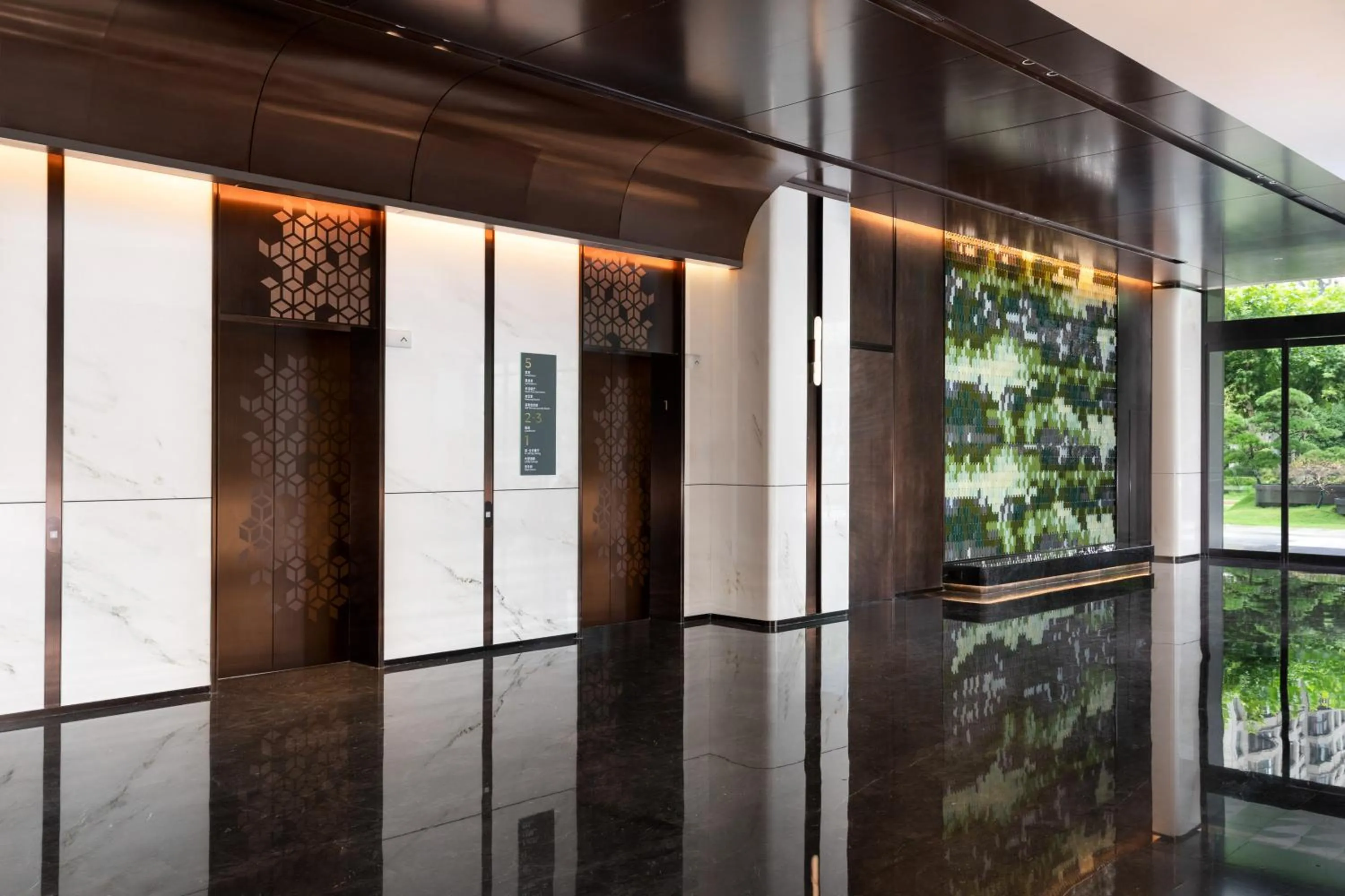 elevator in Holiday Inn & Suites Shanghai Changfeng by IHG