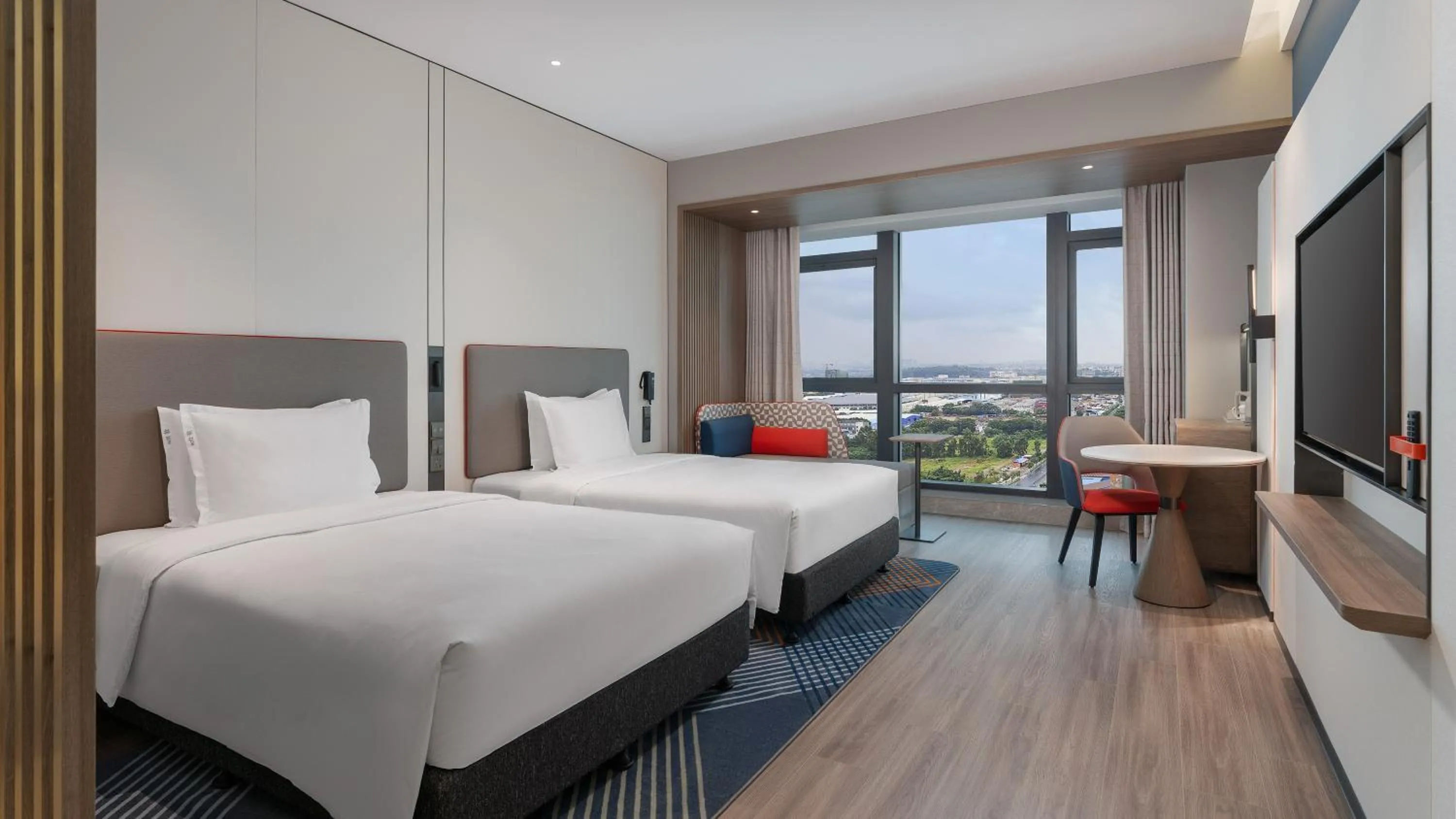 Bed in Holiday Inn Express Foshan Sanshui by IHG