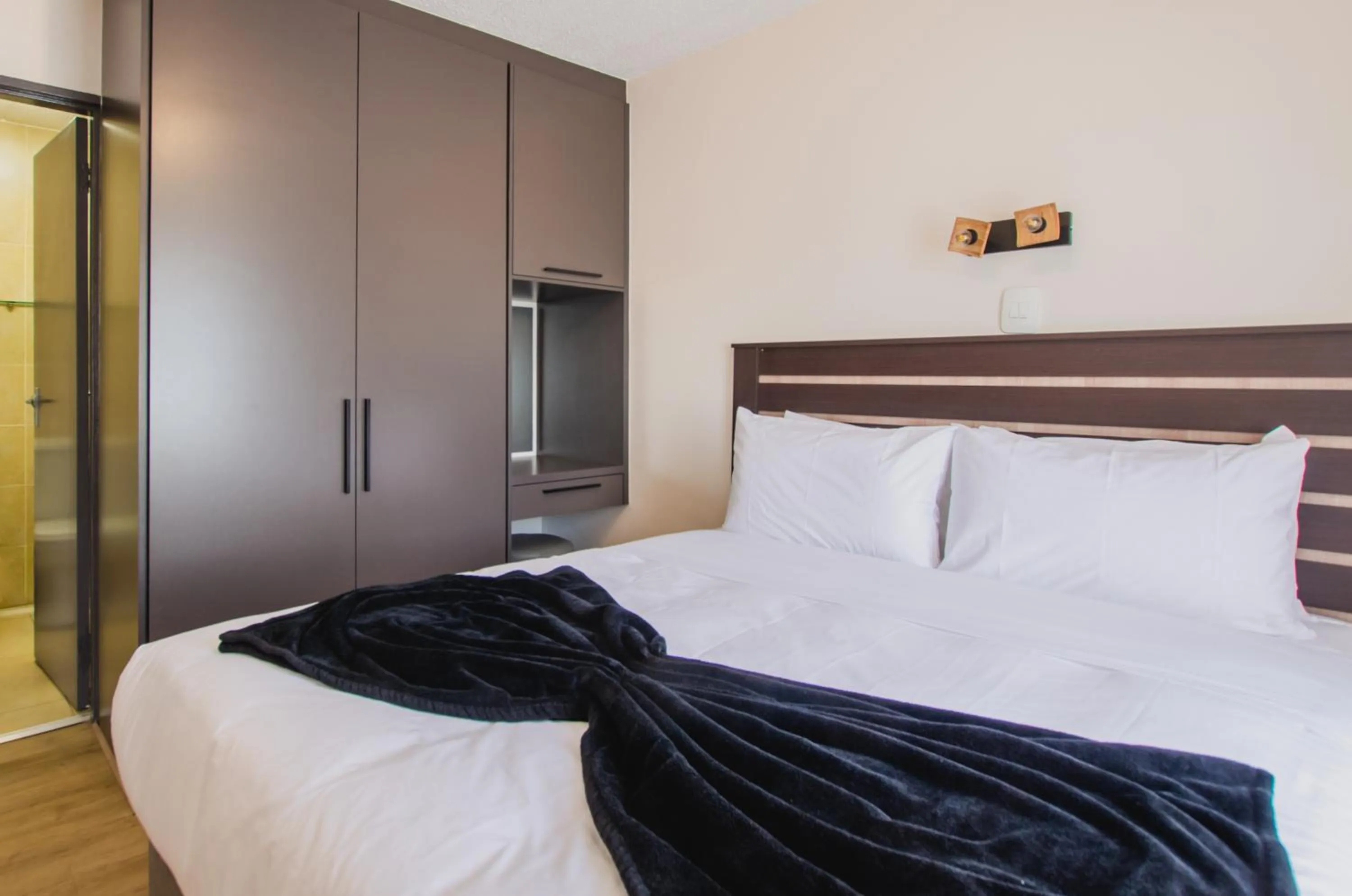 Bed in Melrose Corner Self-Catering Hotel Apartments