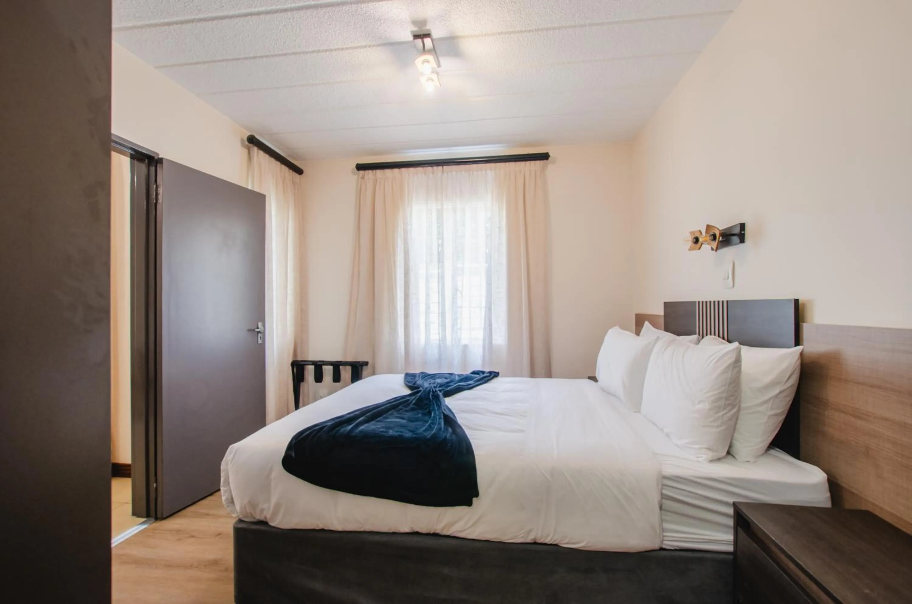 Bed in Melrose Corner Self-Catering Hotel Apartments