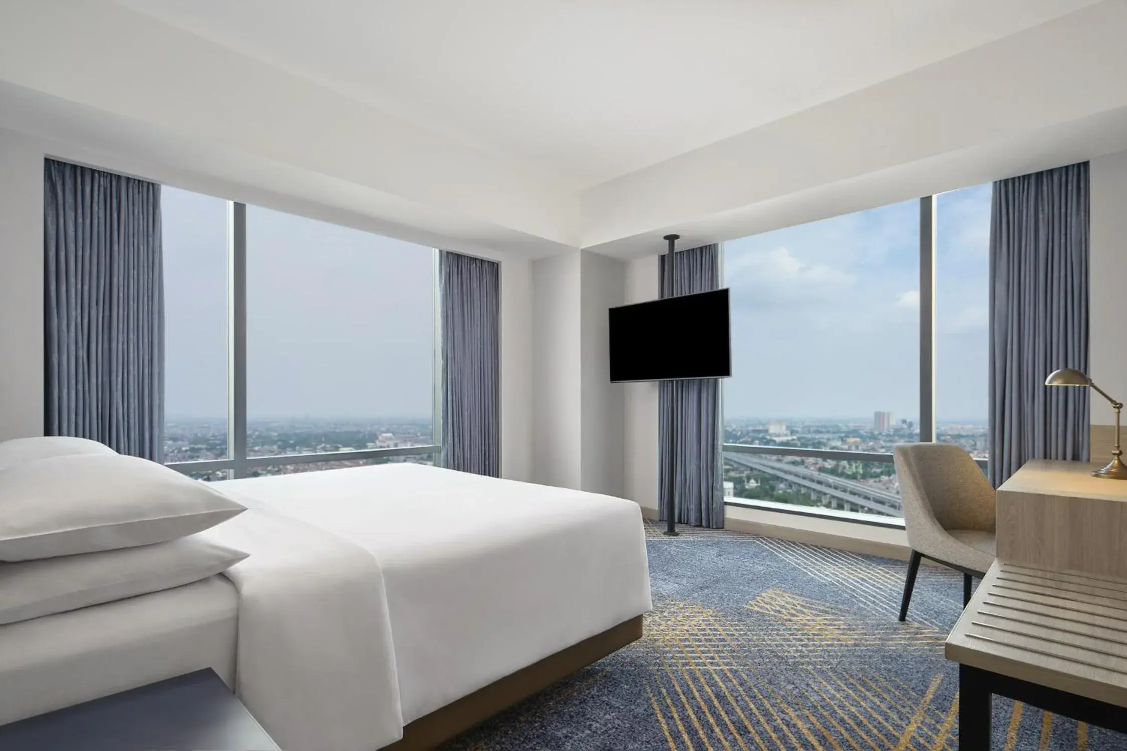 Junior King Suite with Skyline View in Four Points by Sheraton Bekasi Junior King Suite with Skyline View in Four Points by Sheraton Bekasi