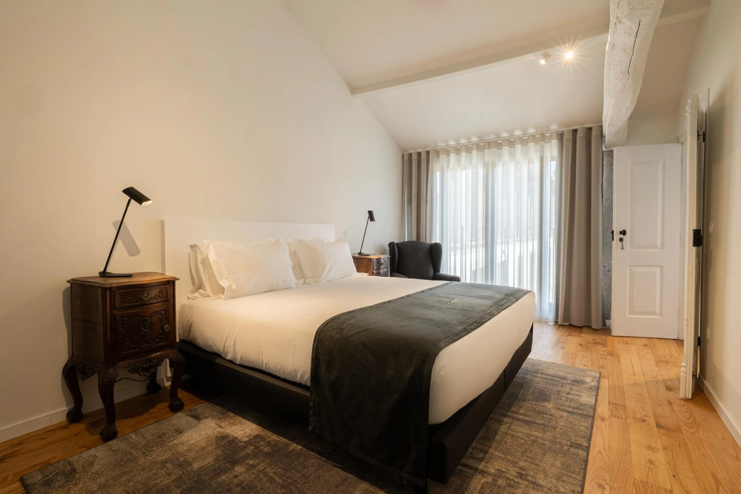 Bed in CasaNova Farmhouse