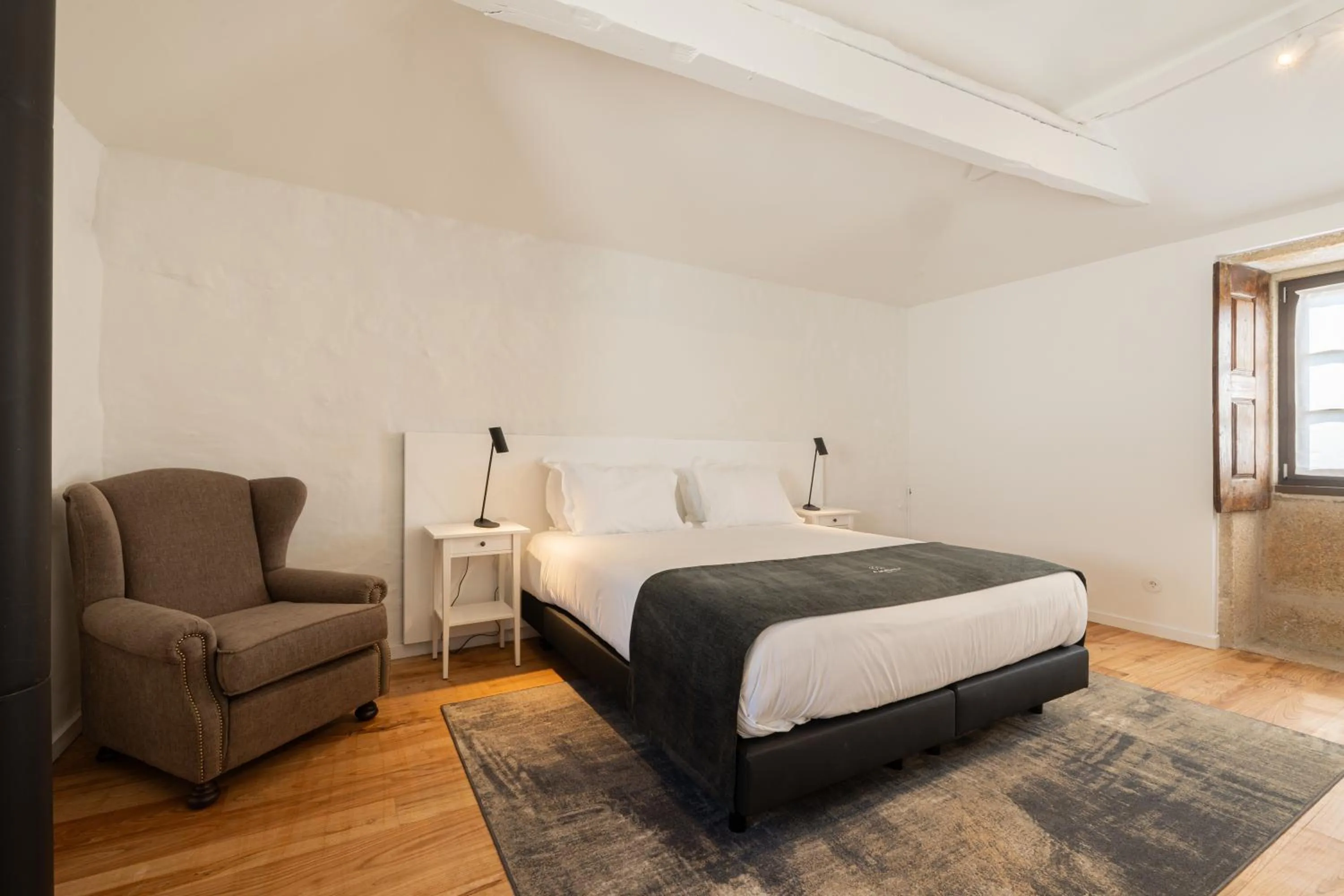 Bed in CasaNova Farmhouse