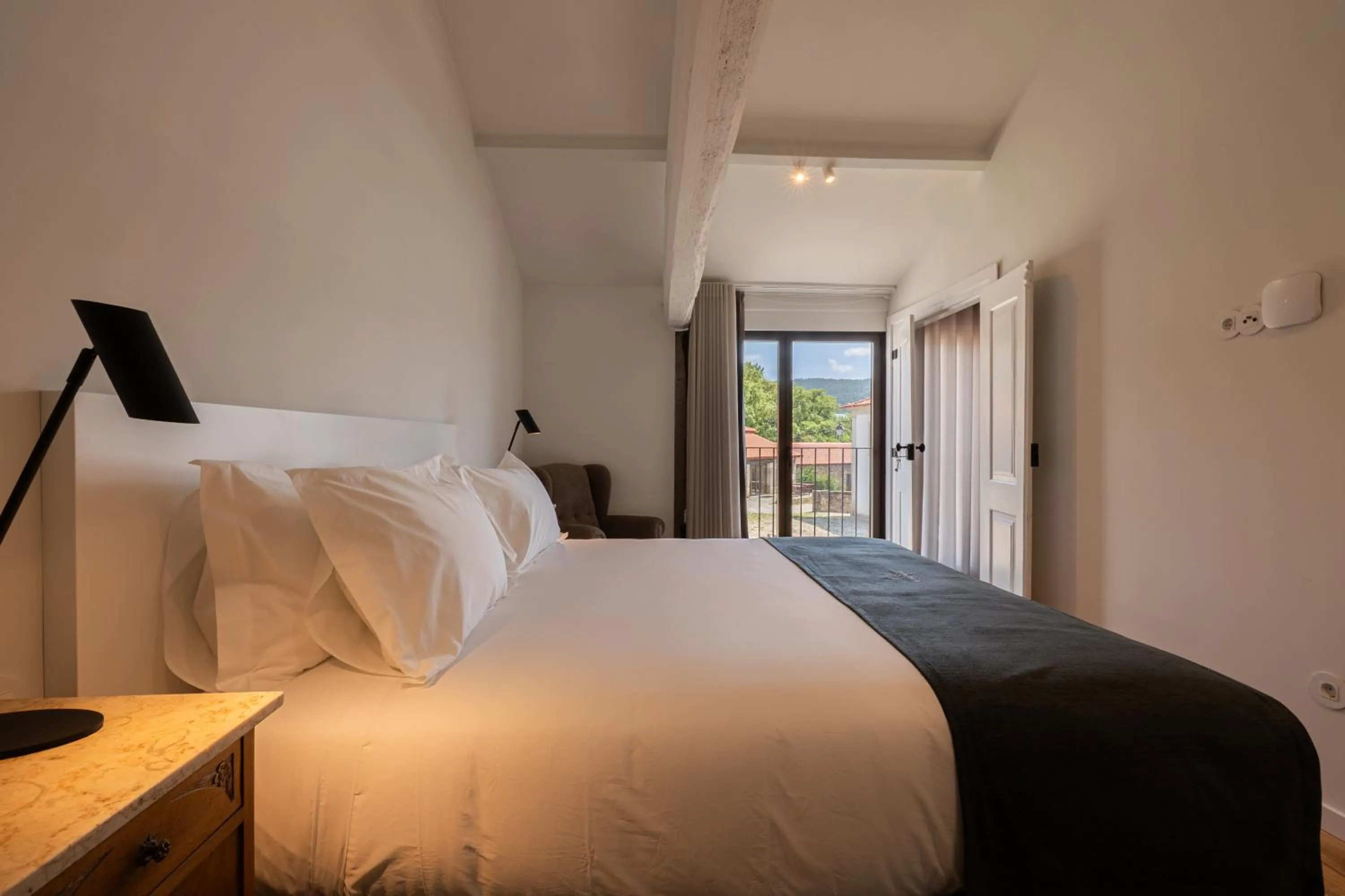 Bed in CasaNova Farmhouse