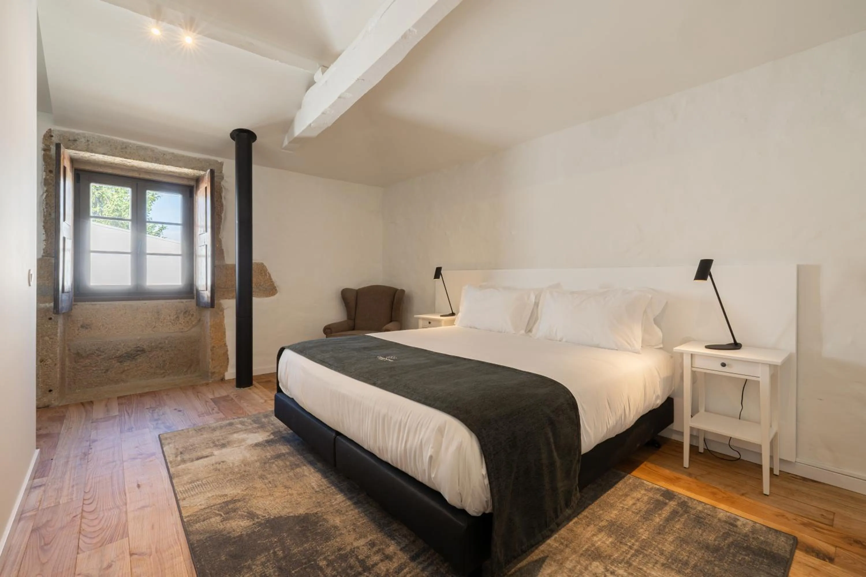 Bed in CasaNova Farmhouse