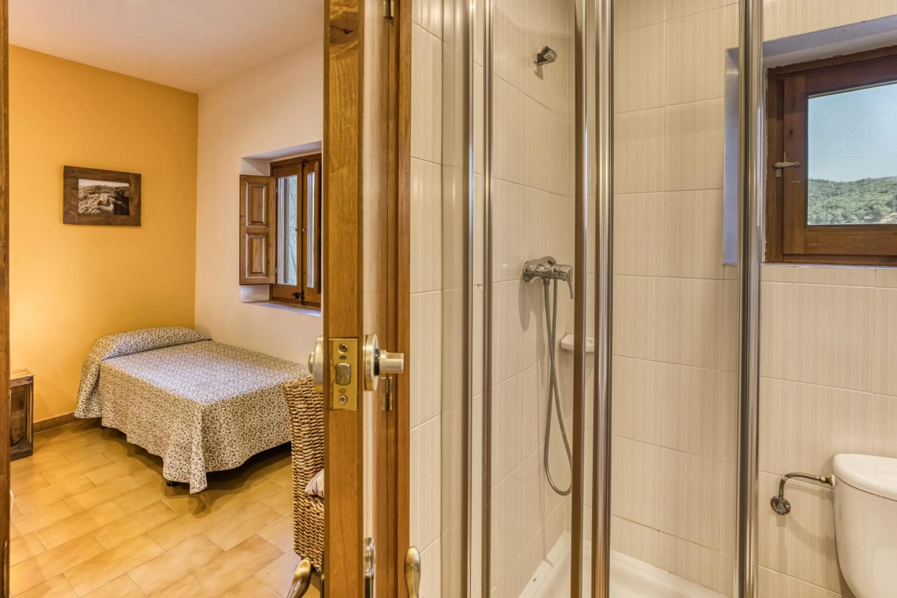 Bathroom, Bed in Casa Rural Can Miquel