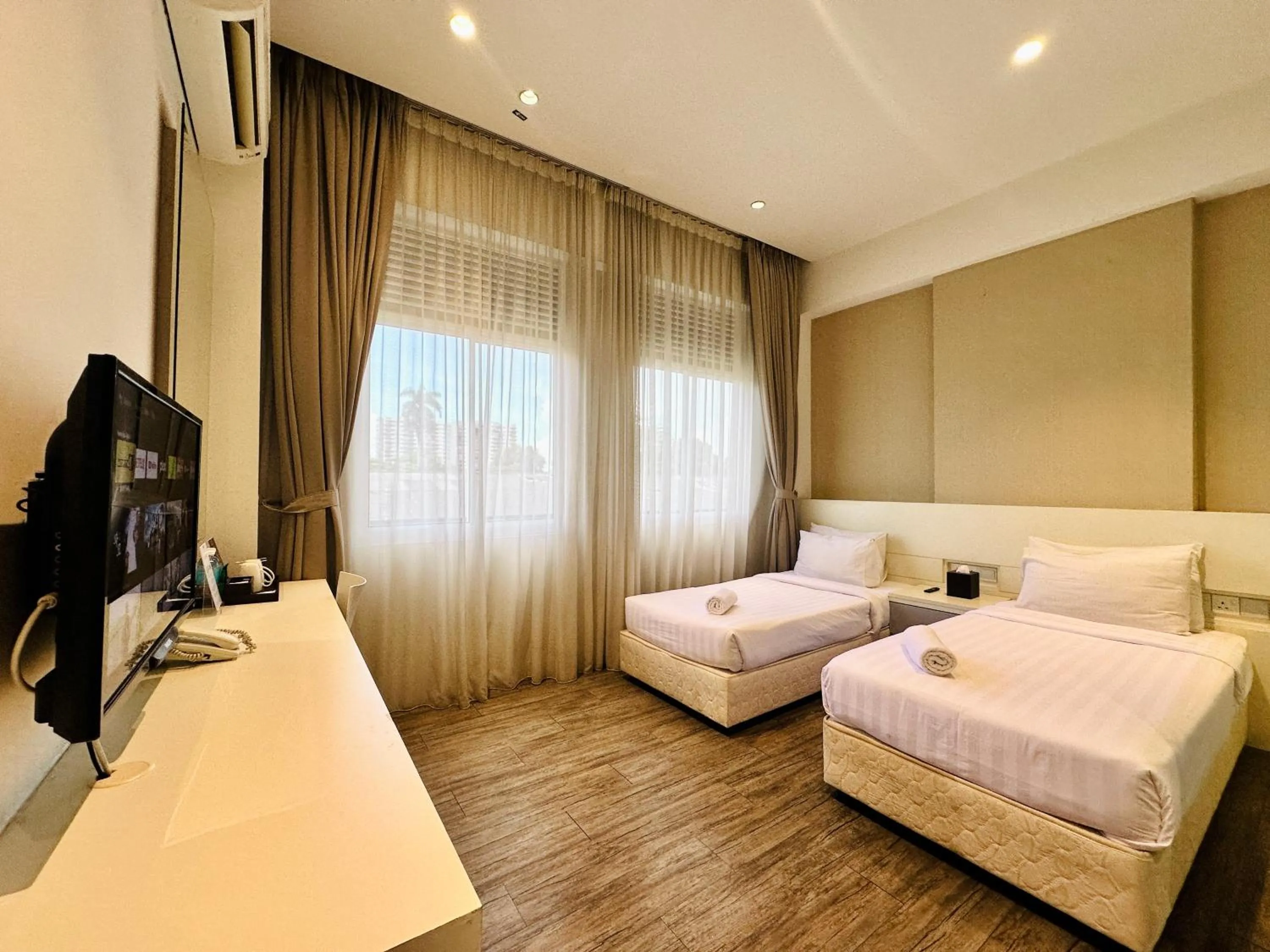 Bed in C Y C Heritage Hotel