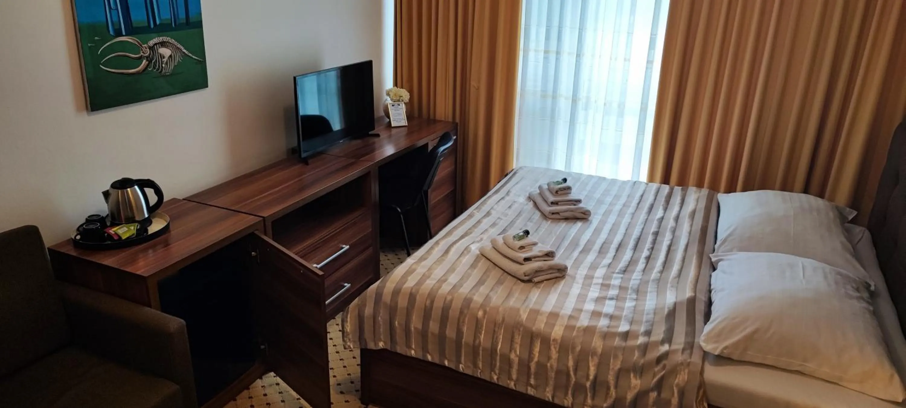 Bed in Hotel Merkur