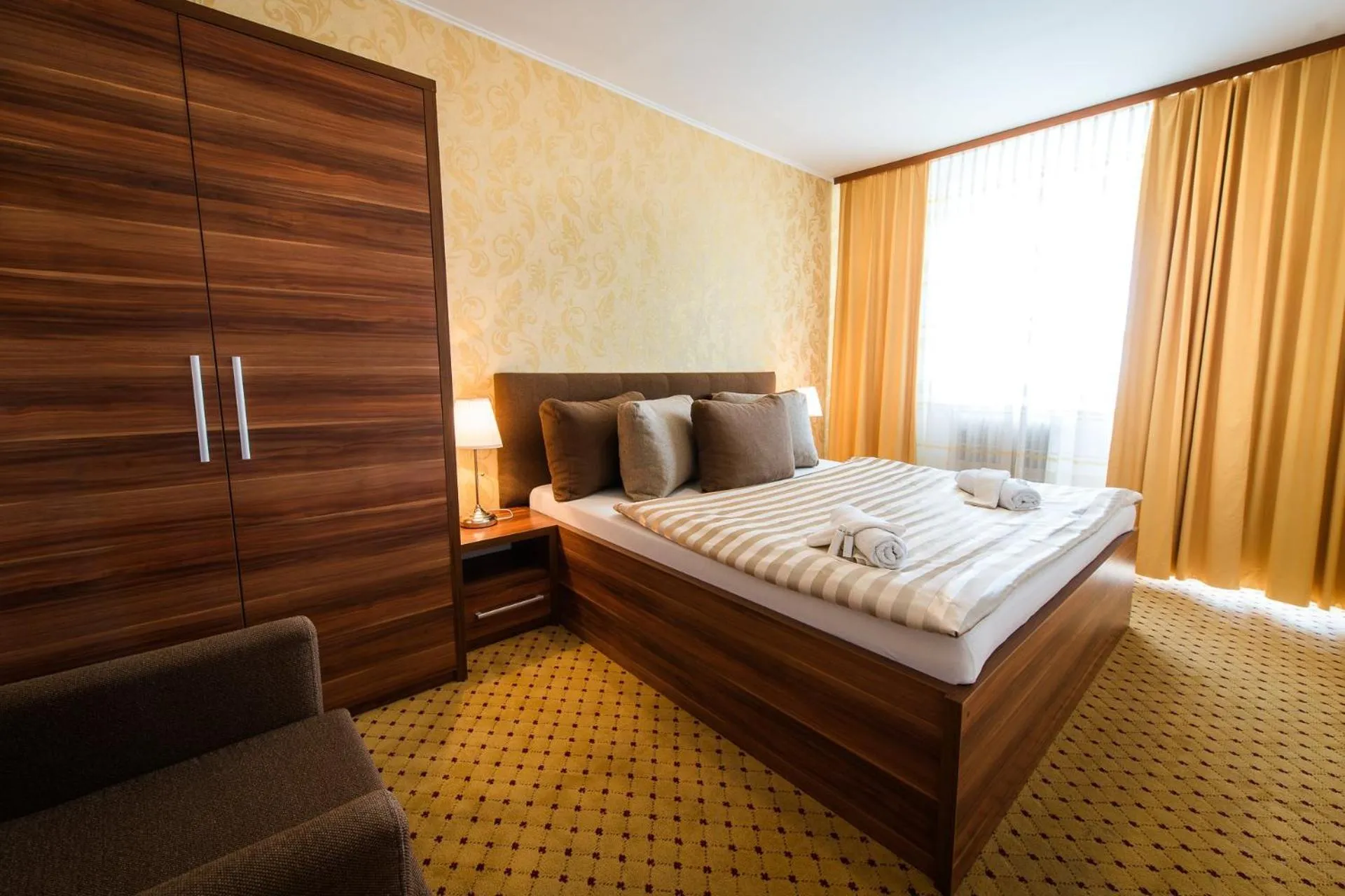 Photo of the whole room, Bed in Hotel Merkur