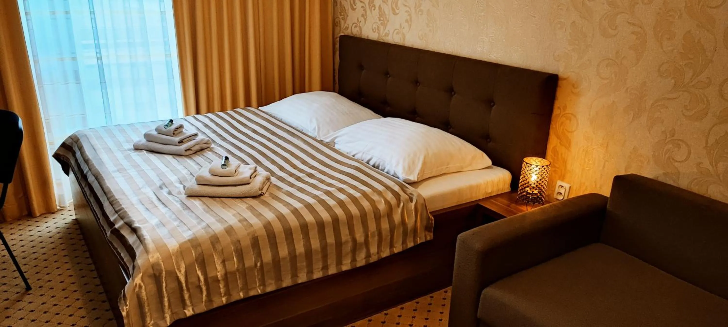 Bed in Hotel Merkur