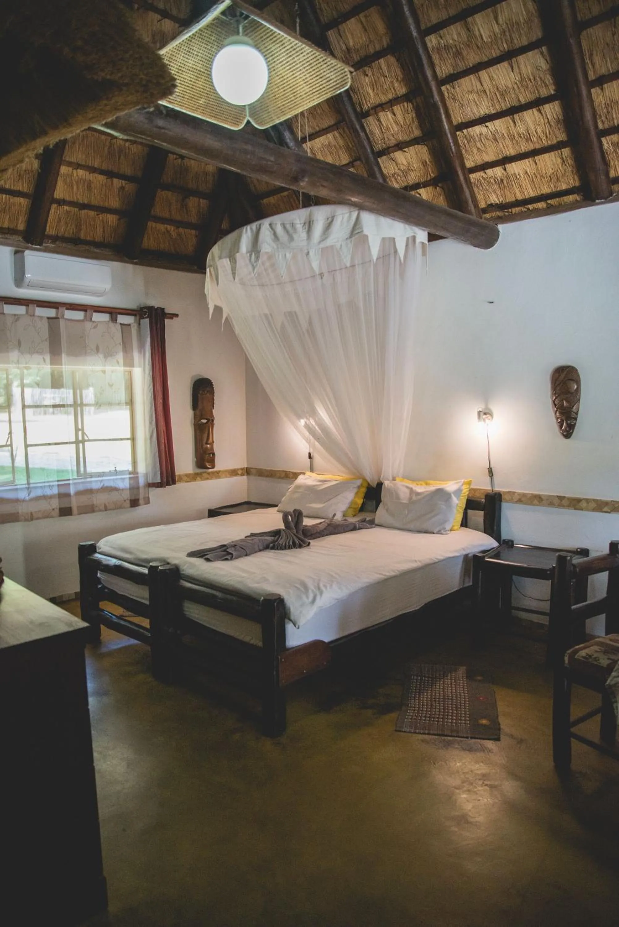 Photo of the whole room, Bed in Thokozani Lodge