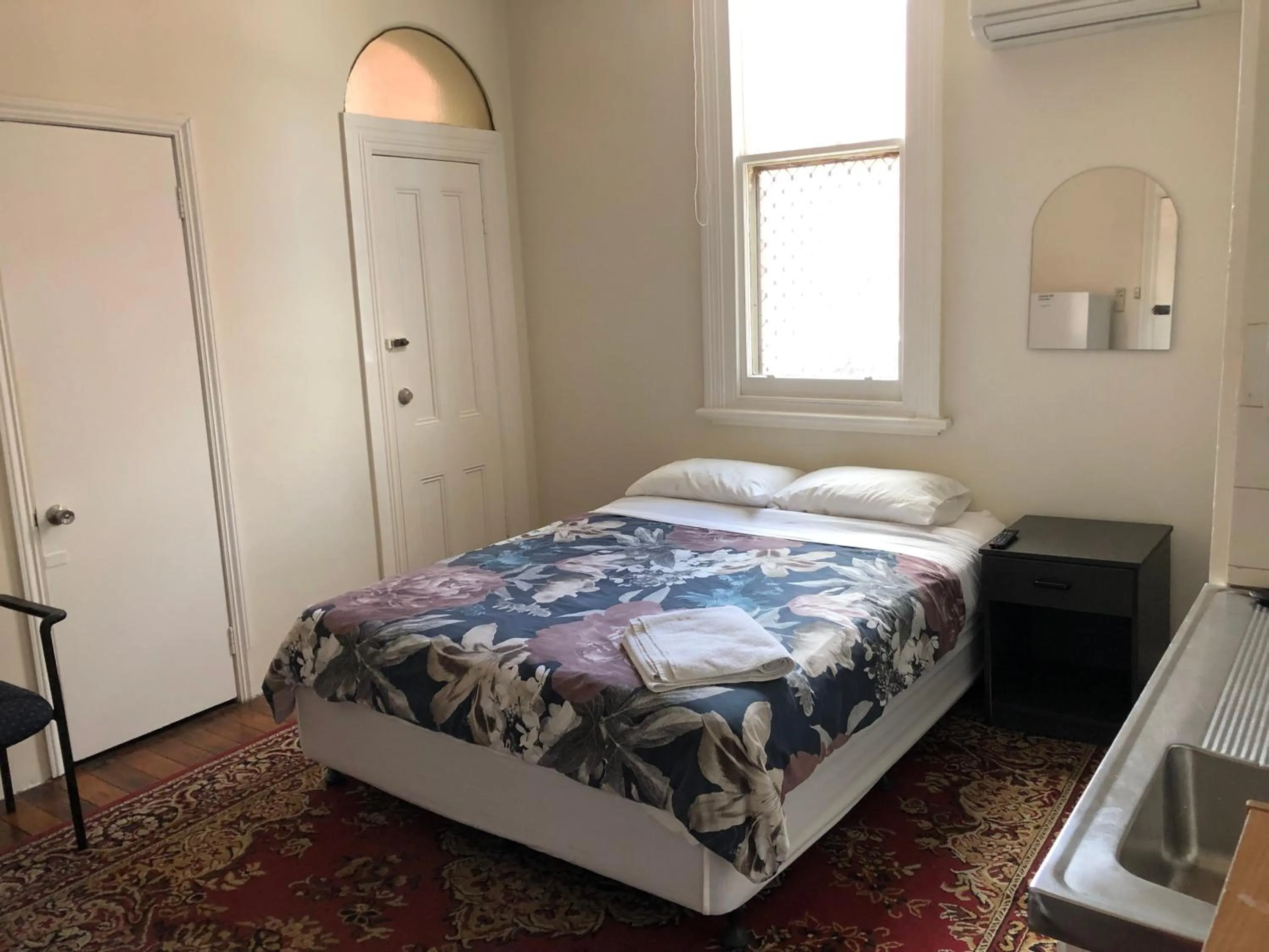 Bed in Northlodge Central City Apartments