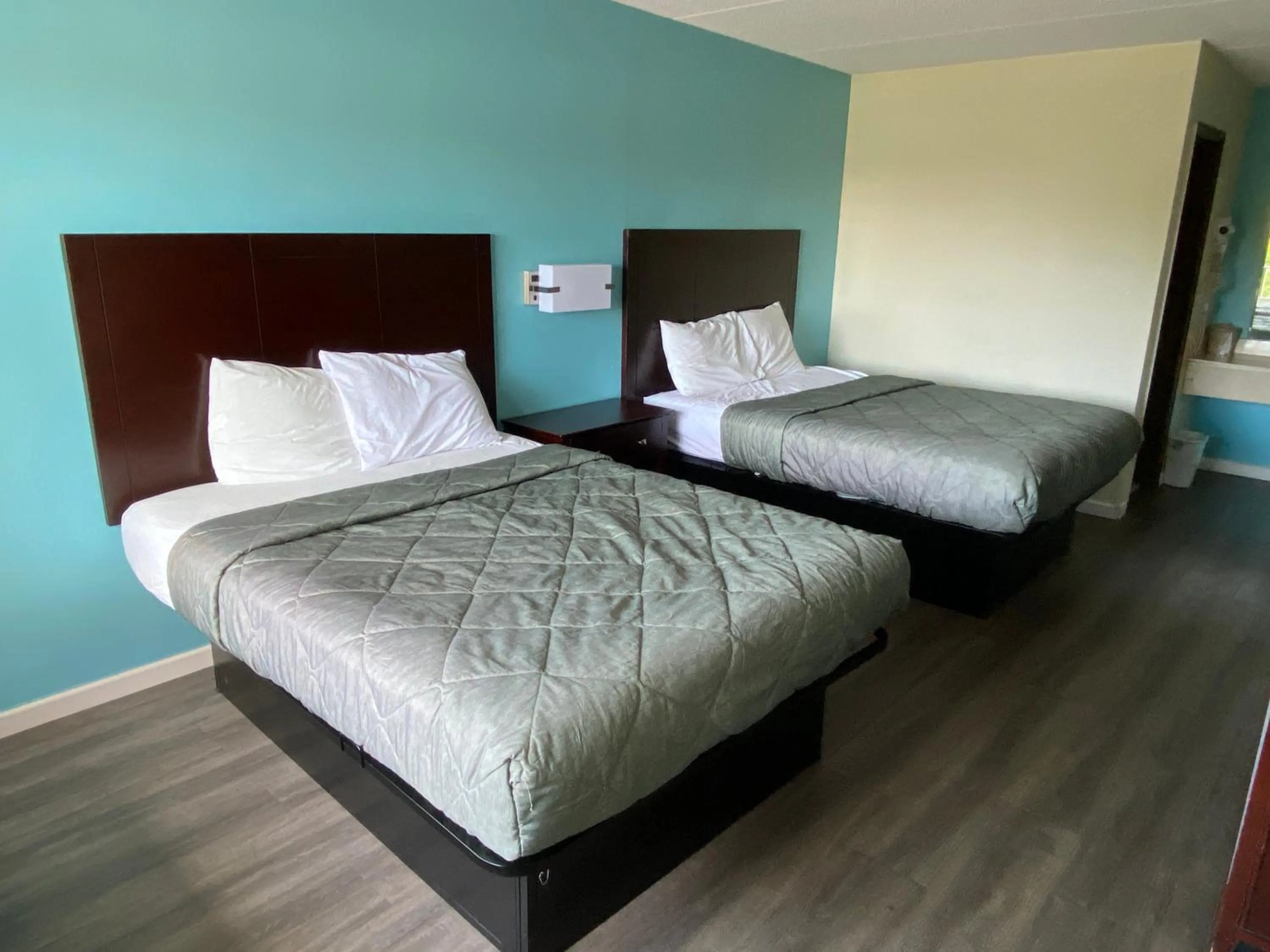 Bed in Havelock inn & suites