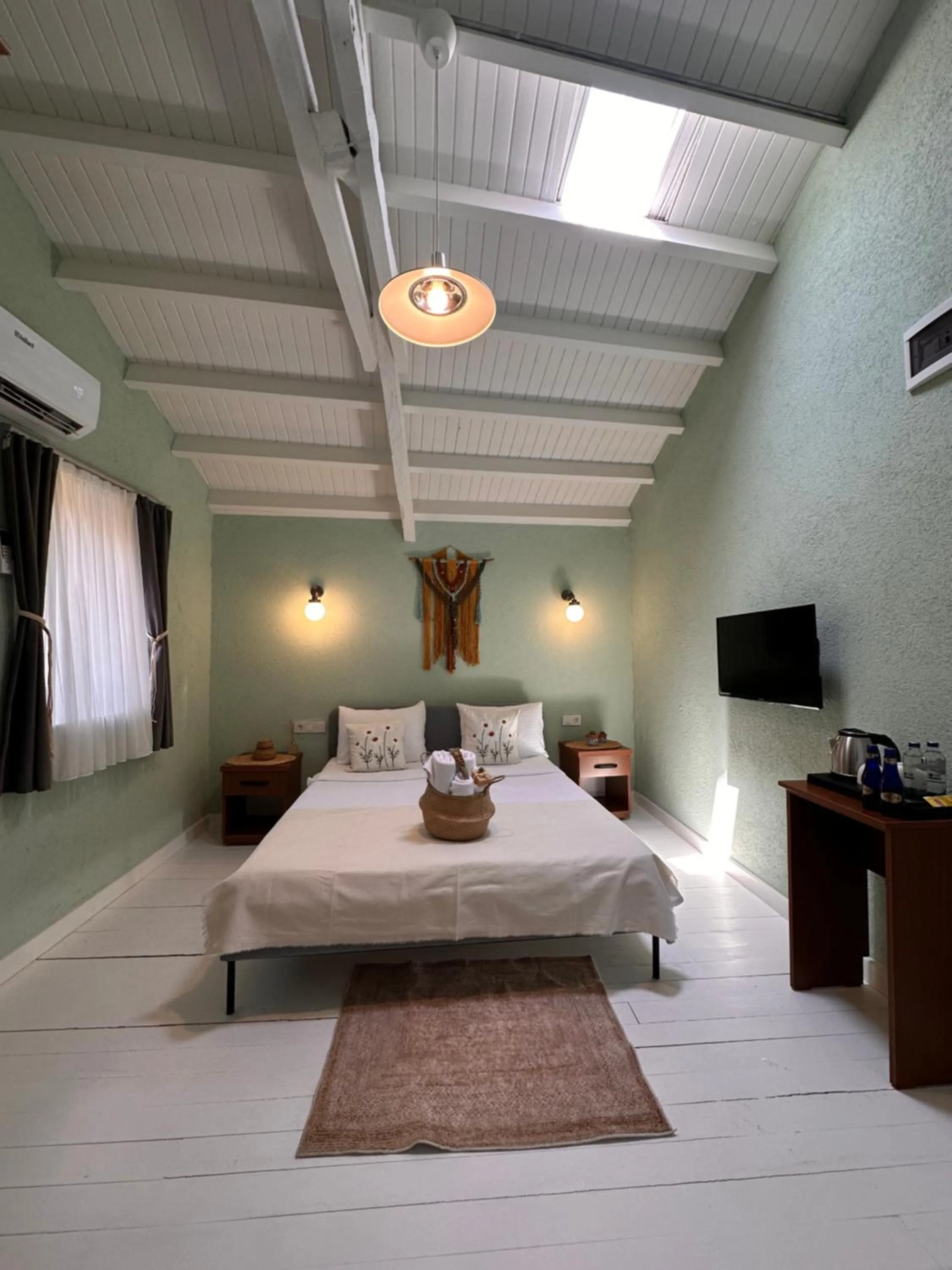 Bed in Hanole Macaron Guest House