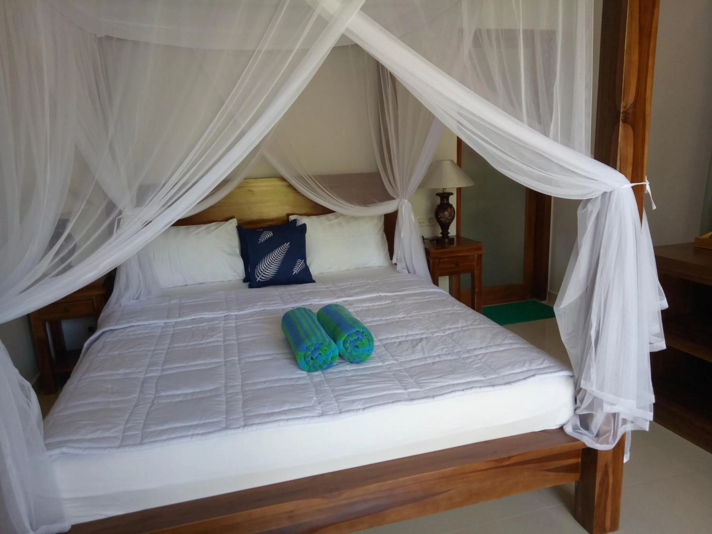 Bed in Suryadina Guest House