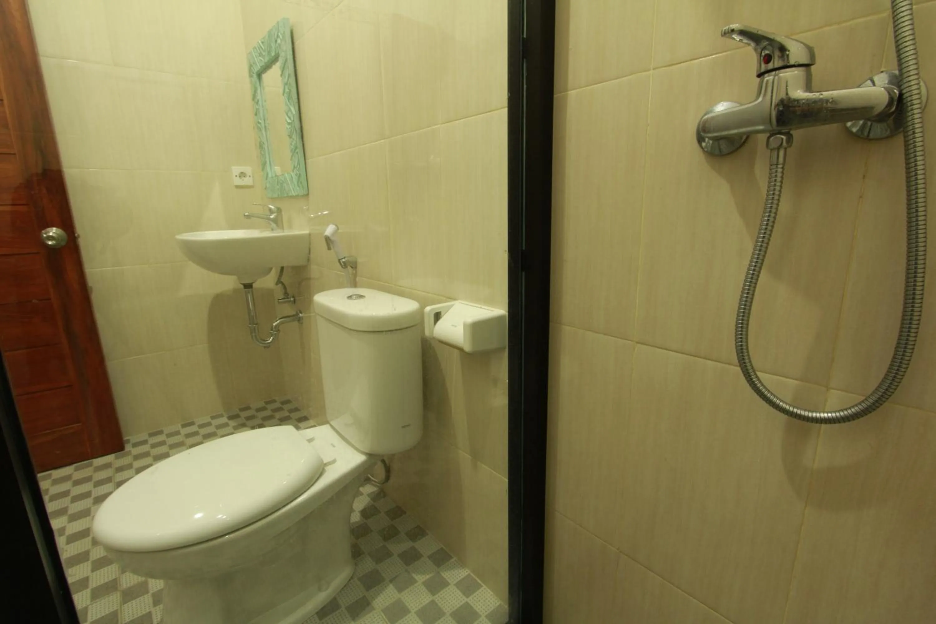 Bathroom in Suryadina Guest House