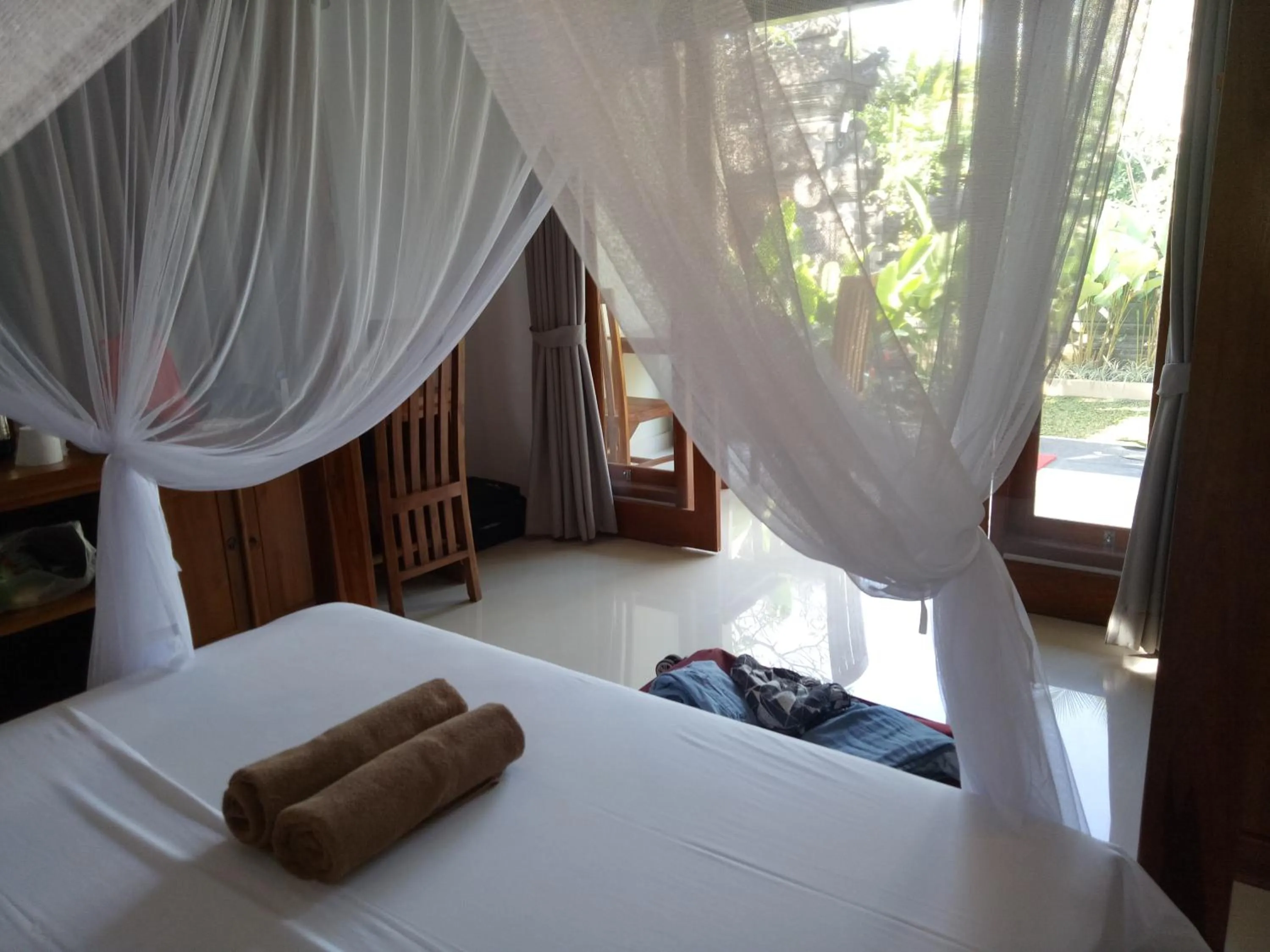 Bed in Suryadina Guest House