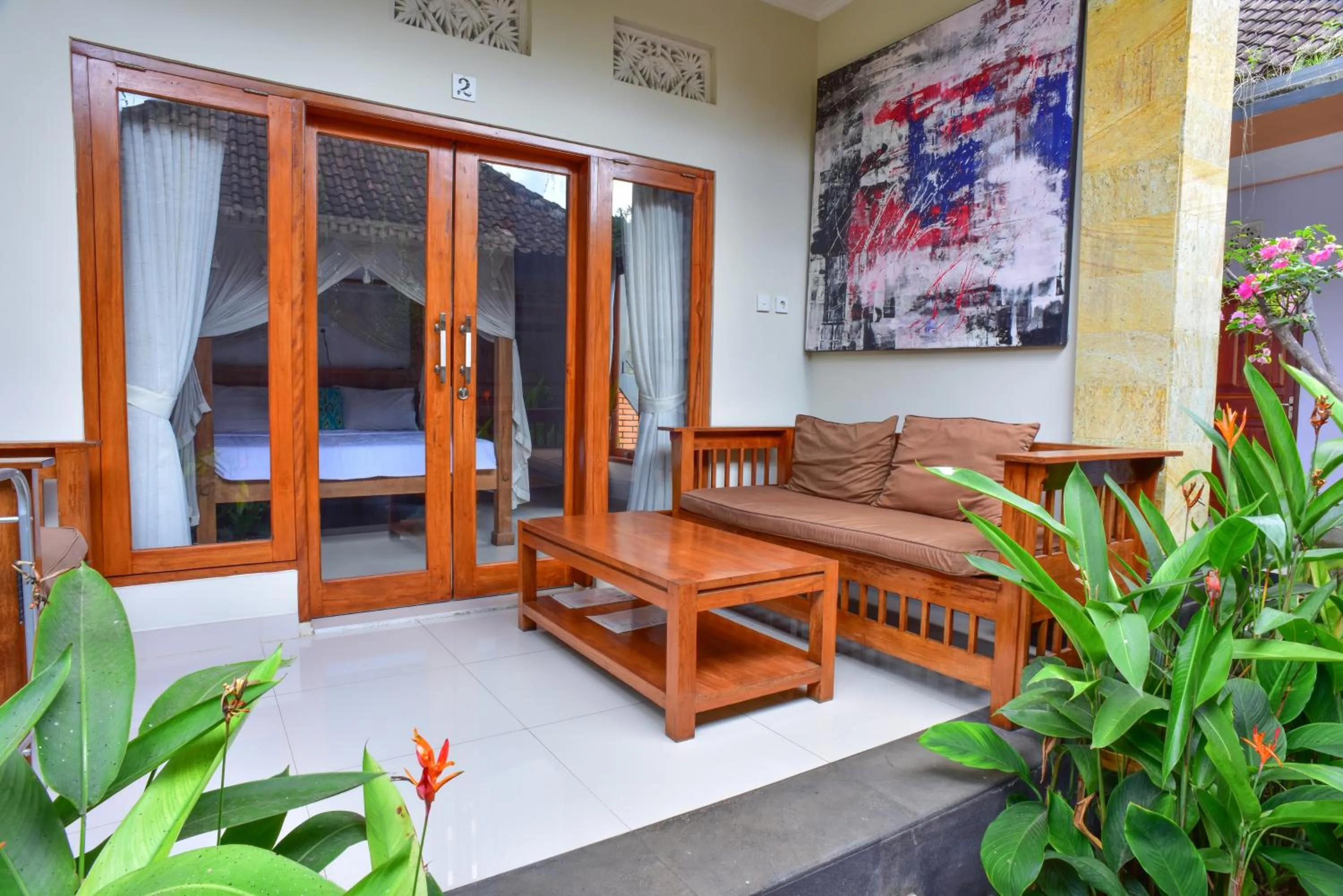 Photo of the whole room in Suryadina Guest House