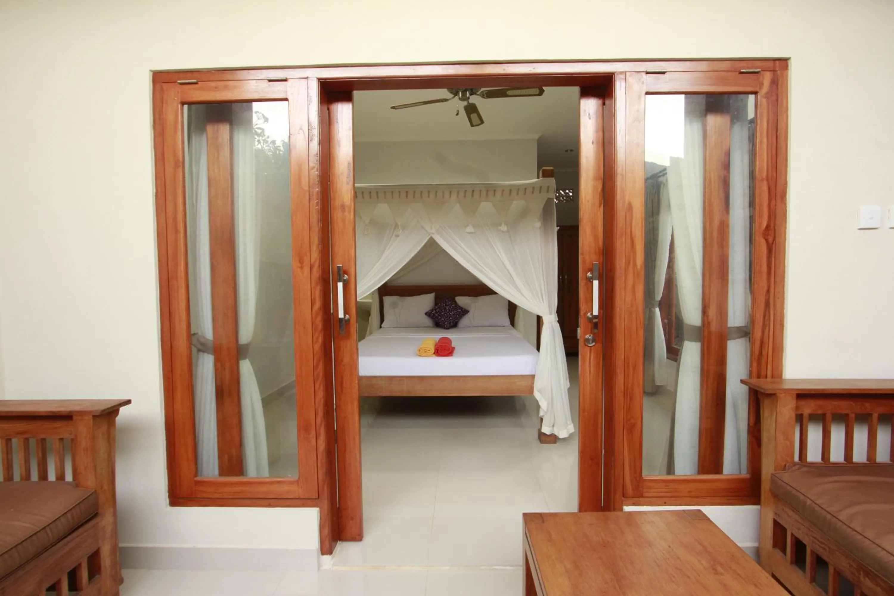 Balcony/Terrace, Bed in Suryadina Guest House