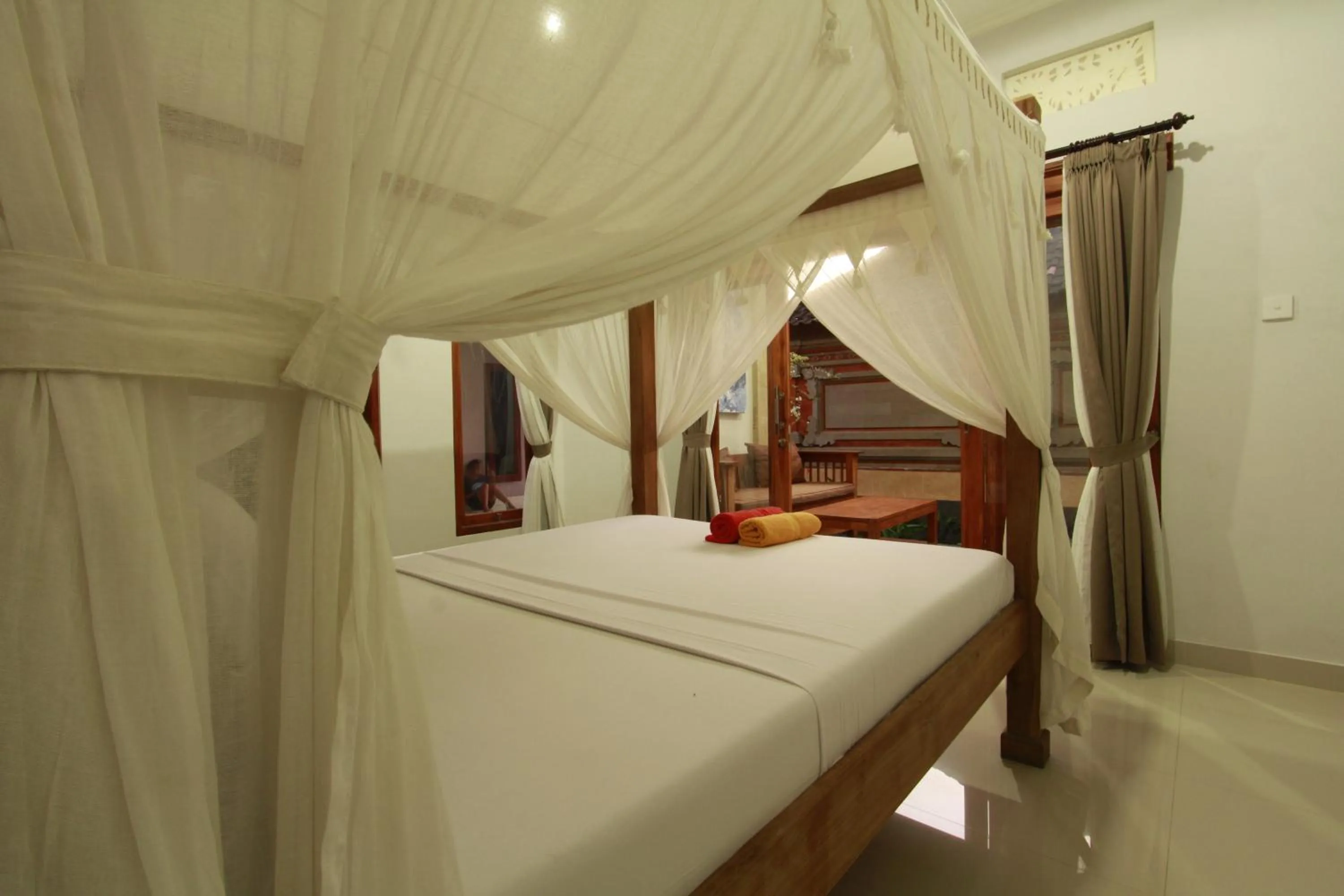 Photo of the whole room, Bed in Suryadina Guest House