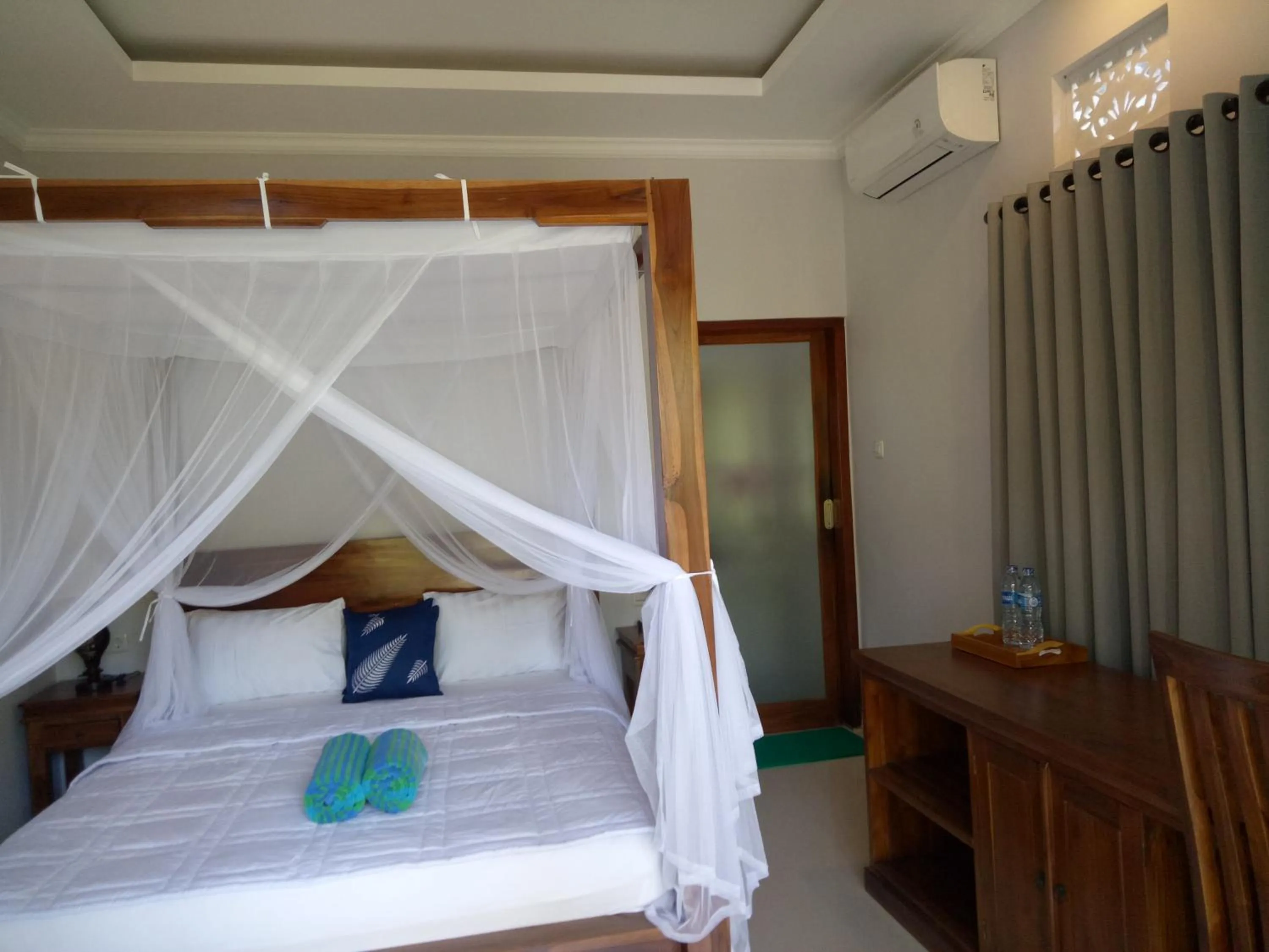 Bed in Suryadina Guest House